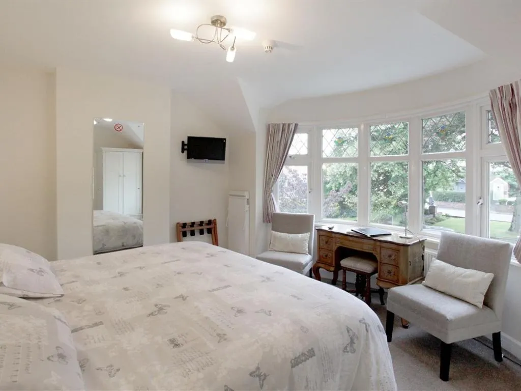 Bed in The Hinton Guest House