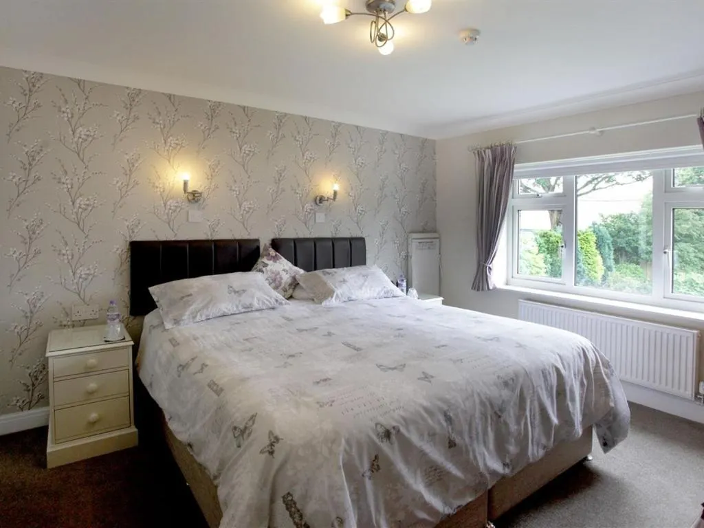 Bed in The Hinton Guest House