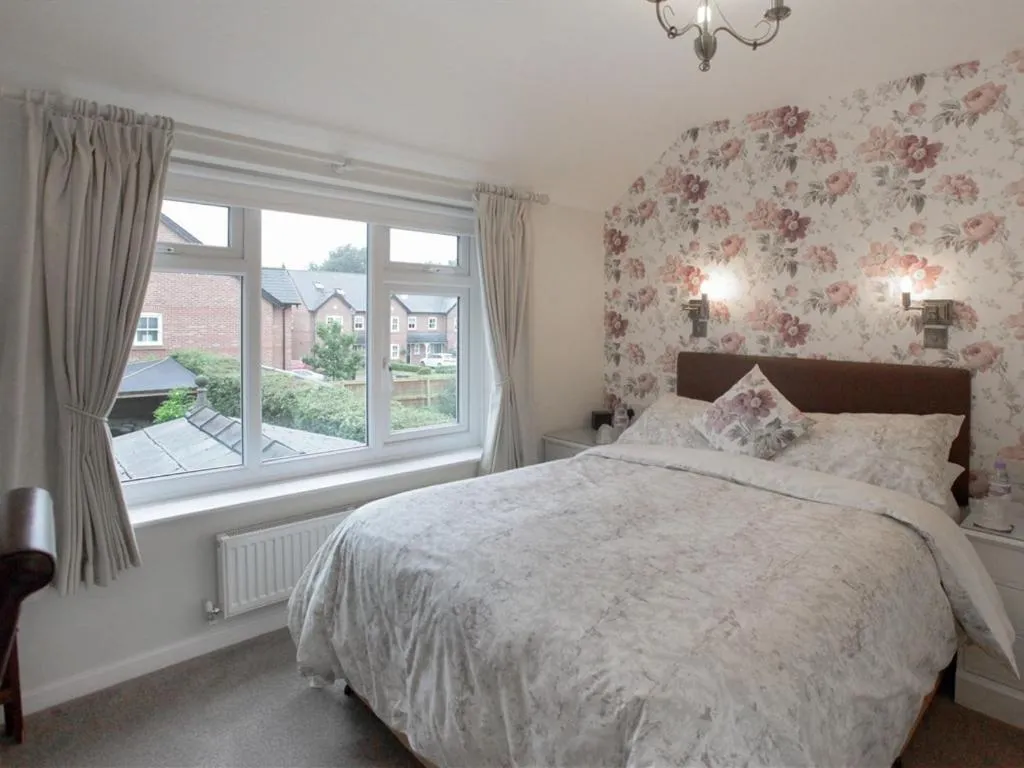 Bed in The Hinton Guest House