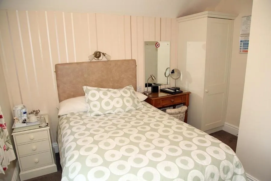 Bed in The Hinton Guest House