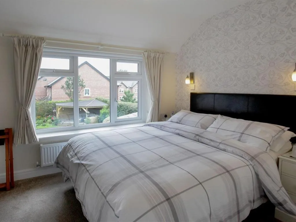 Bed in The Hinton Guest House