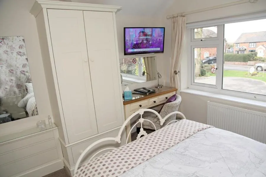 Bed in The Hinton Guest House