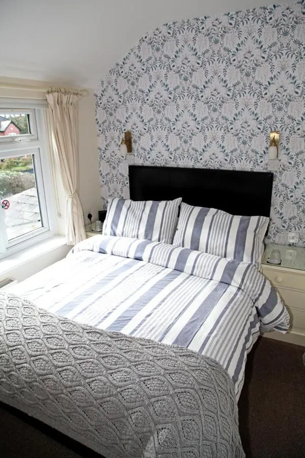 Bed in The Hinton Guest House