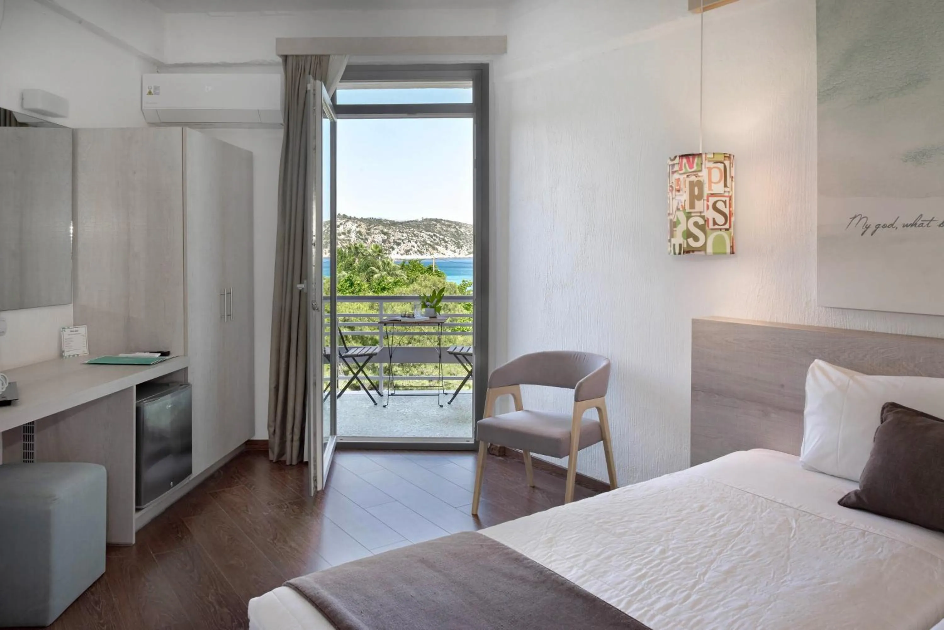 Bed in The Grove Seaside Hotel