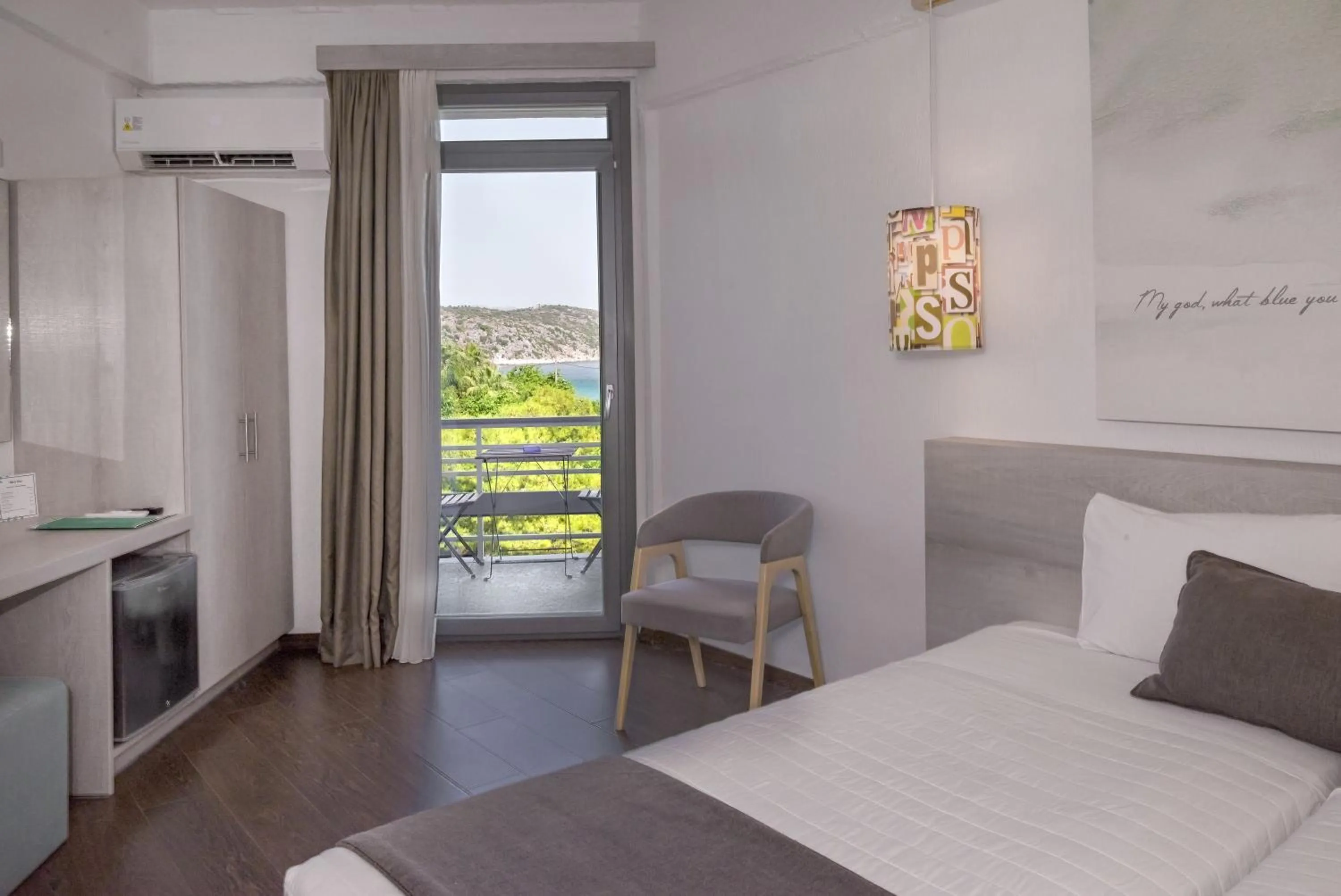 Bed in The Grove Seaside Hotel