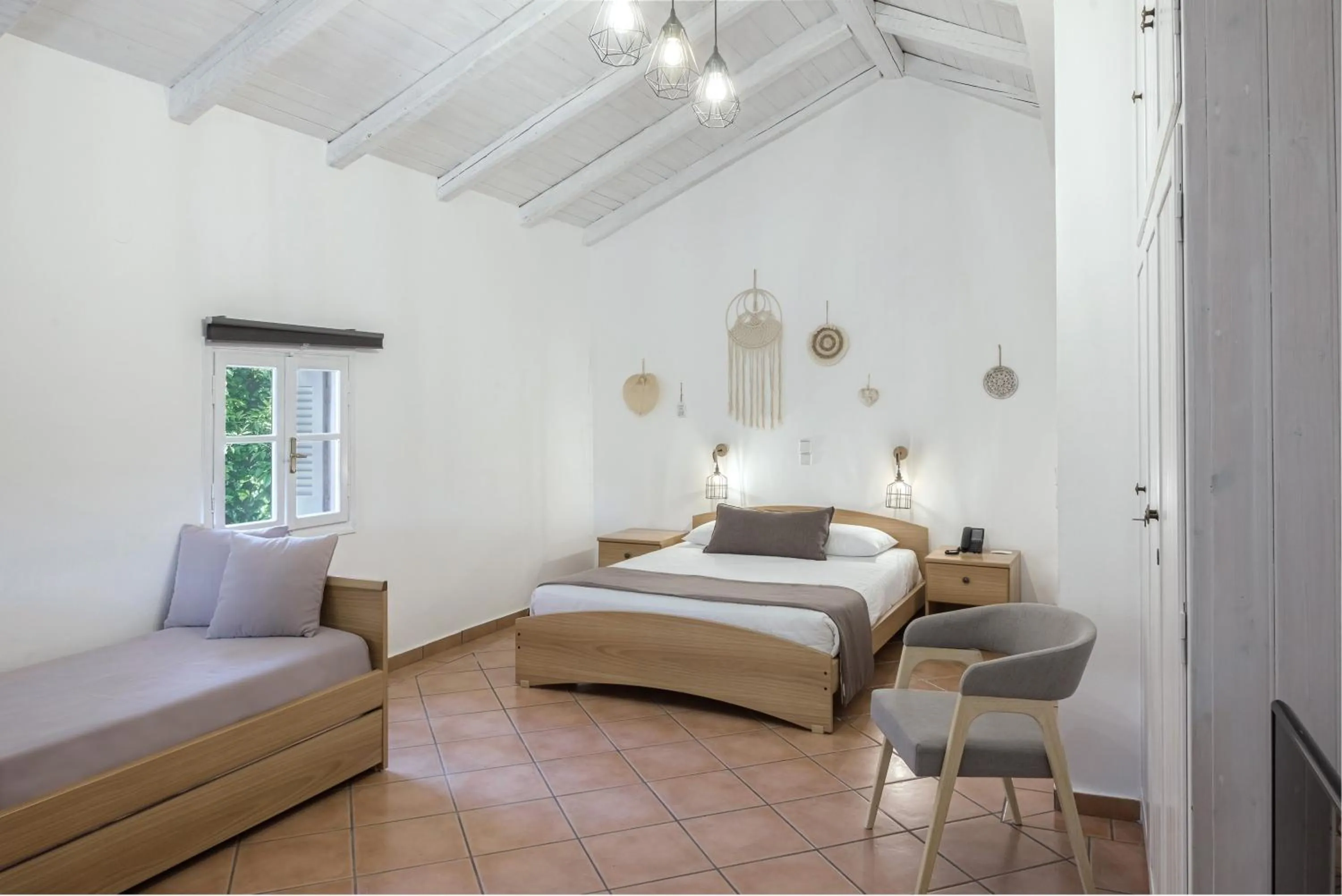 Bed in The Grove Seaside Hotel