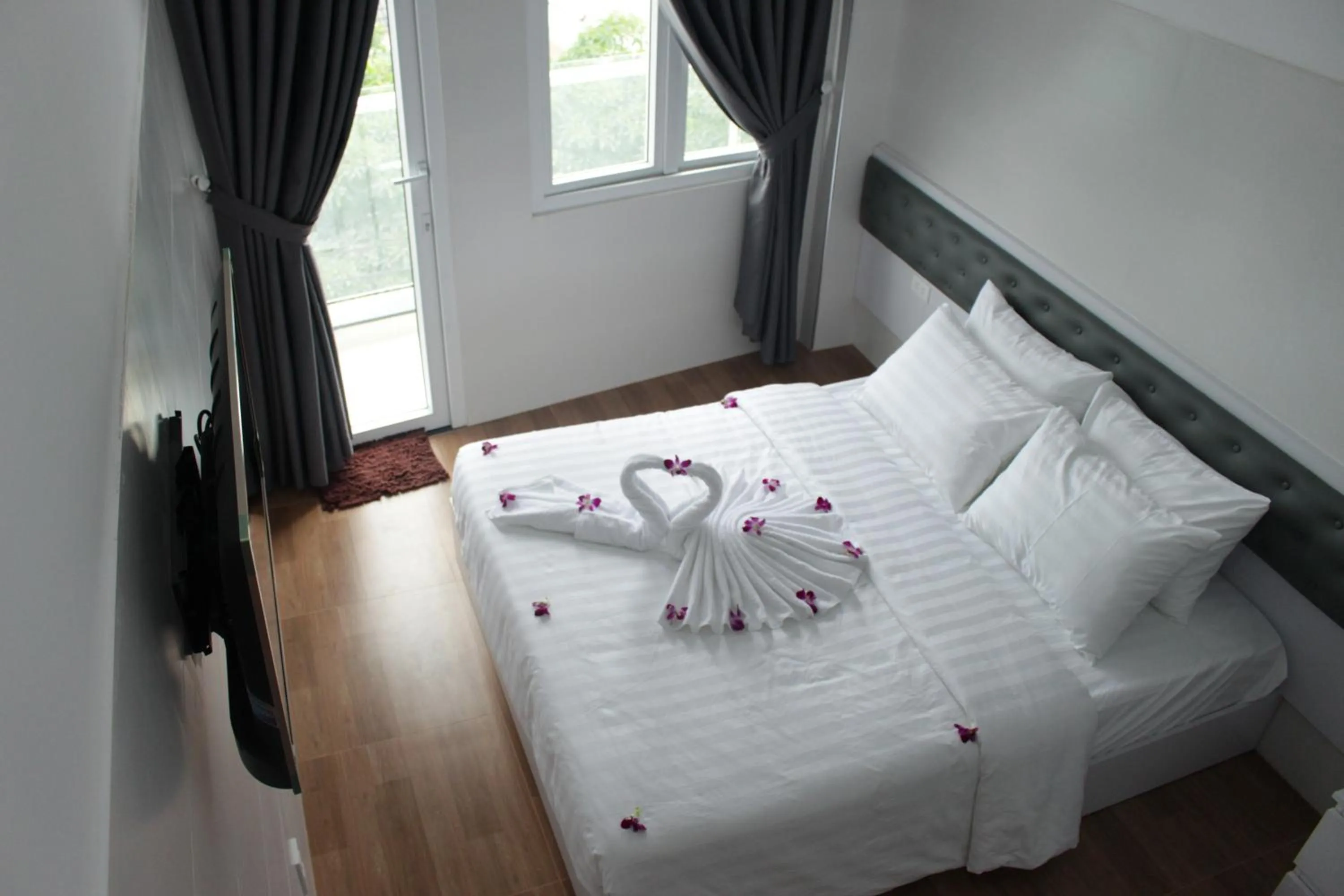 Bed in DRAGON HOTEL 1