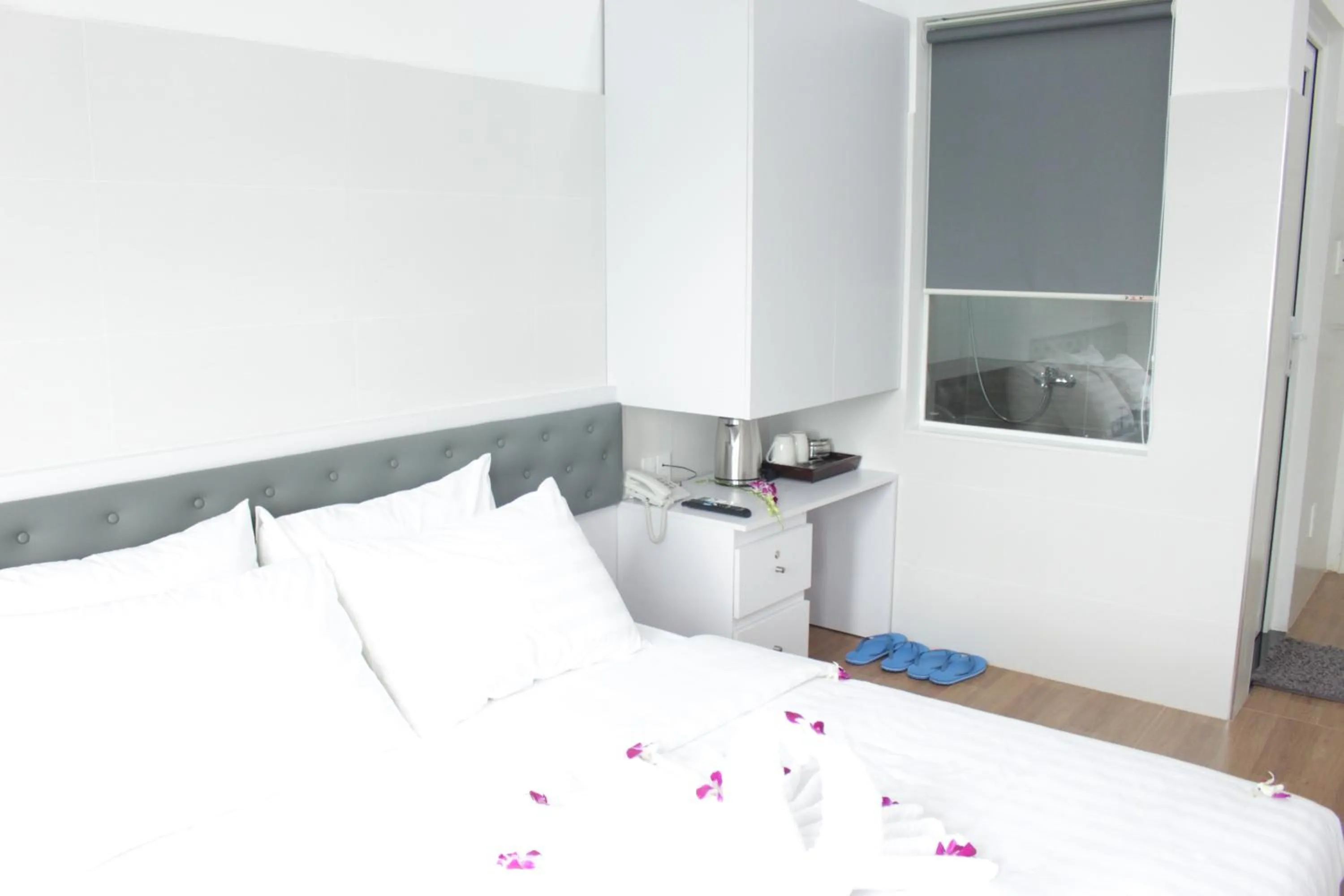 Bed in DRAGON HOTEL 1