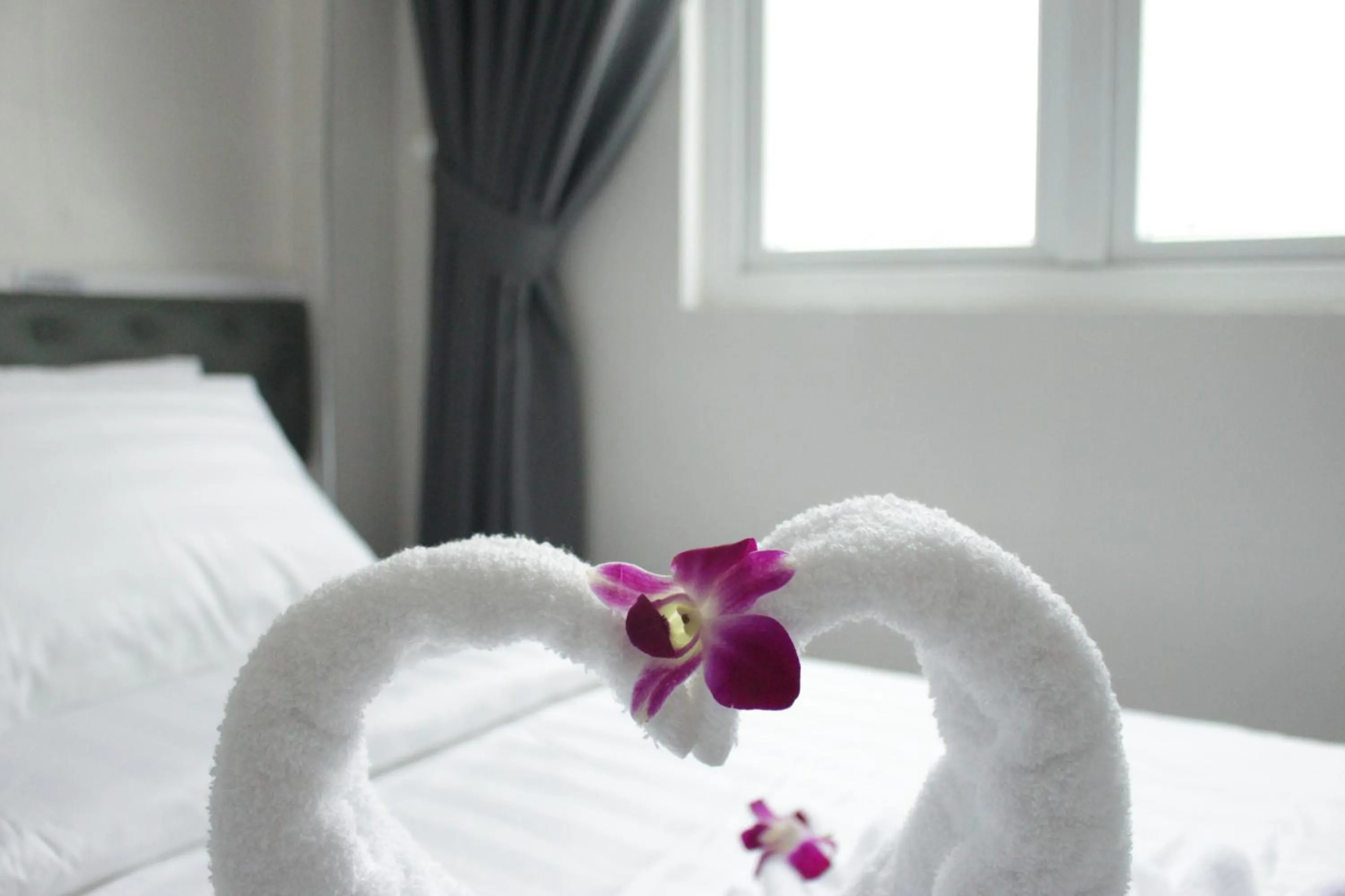 Bed in DRAGON HOTEL 1