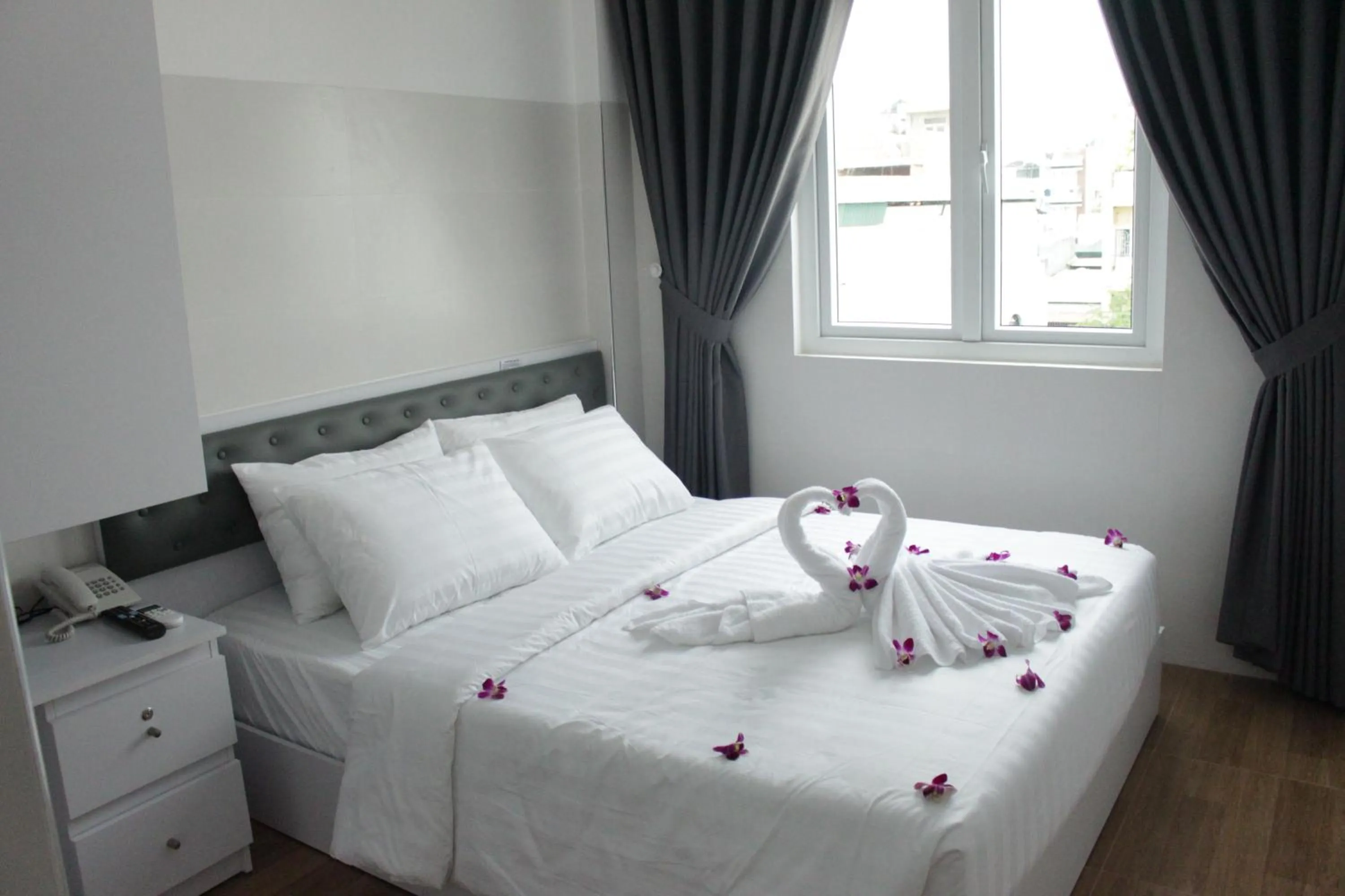 Bed in DRAGON HOTEL 1