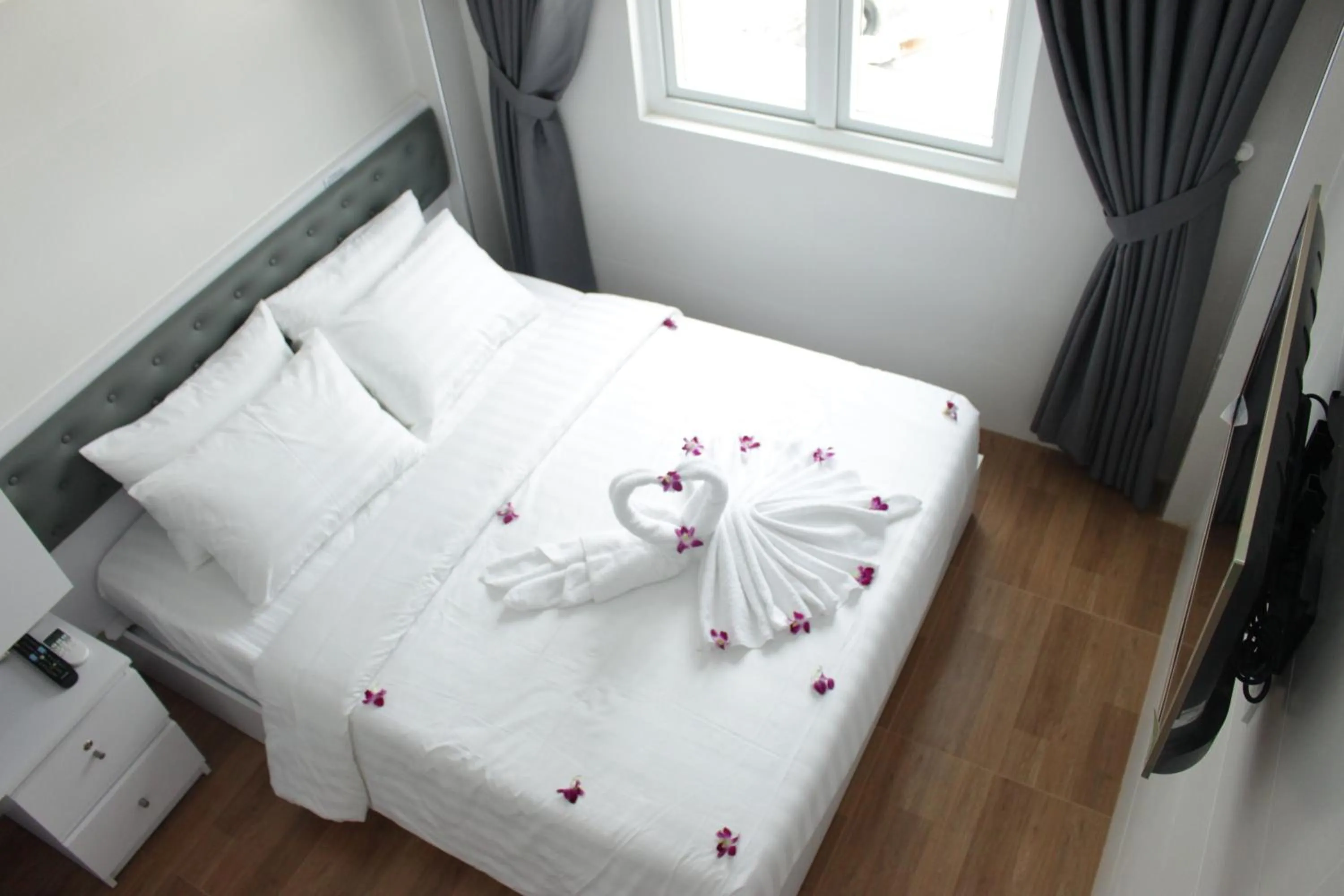 Bed in DRAGON HOTEL 1