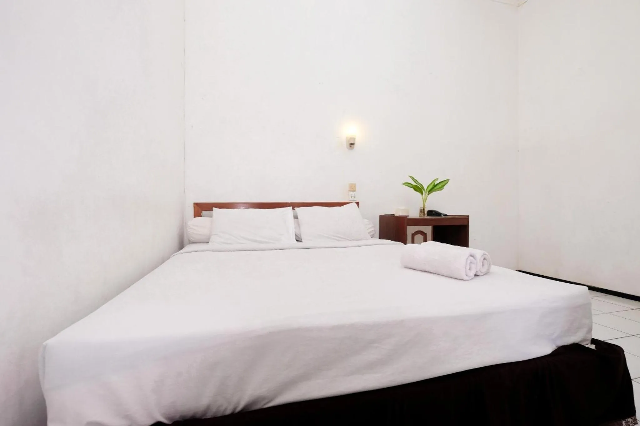 Bed in Berlian Abadi Hotel by Sinergi