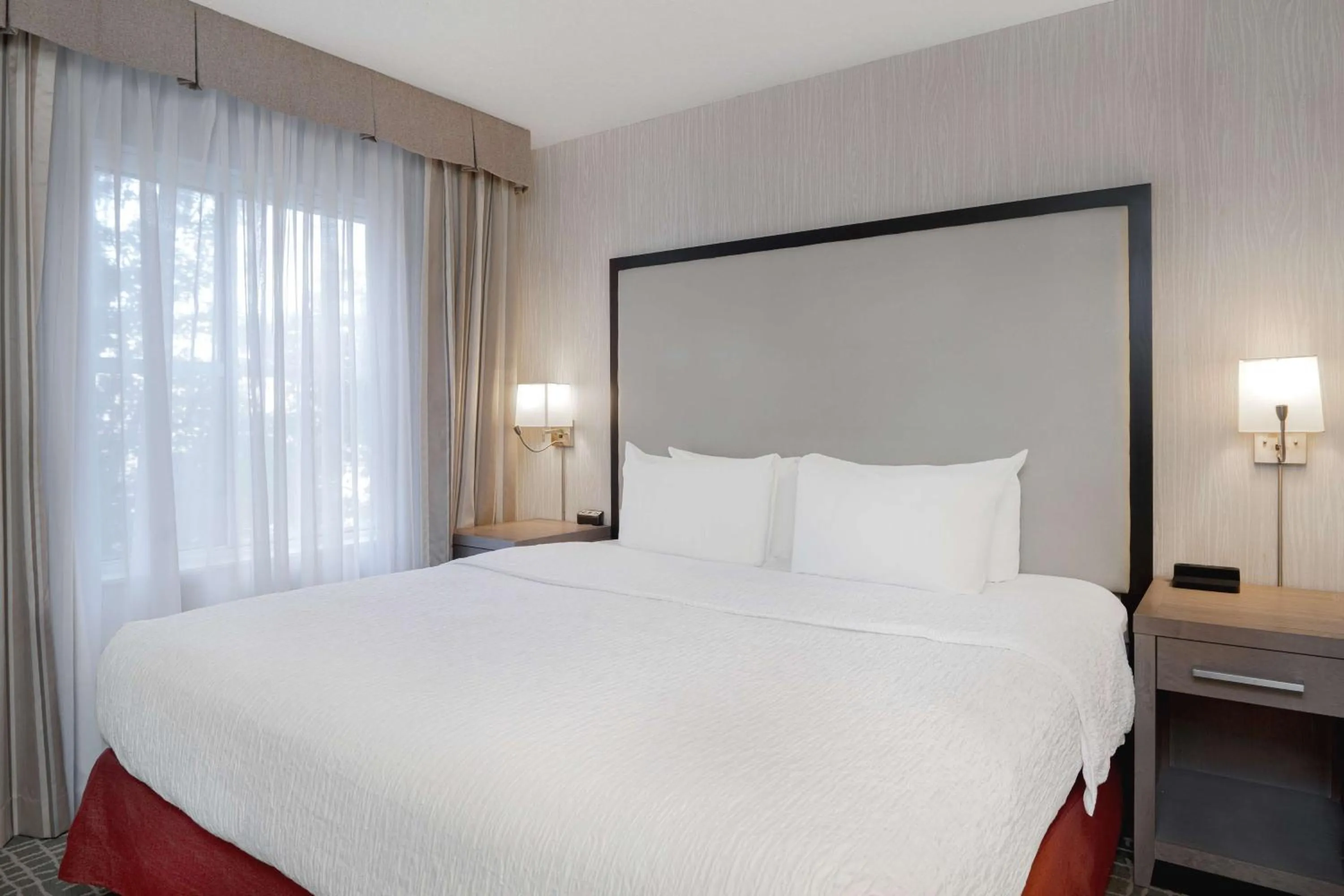 Bed in Homewood Suites by Hilton Tallahassee