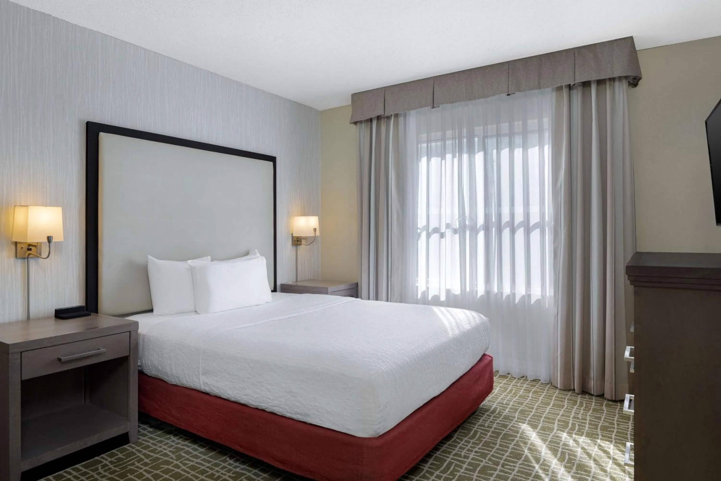 Bed in Homewood Suites by Hilton Tallahassee