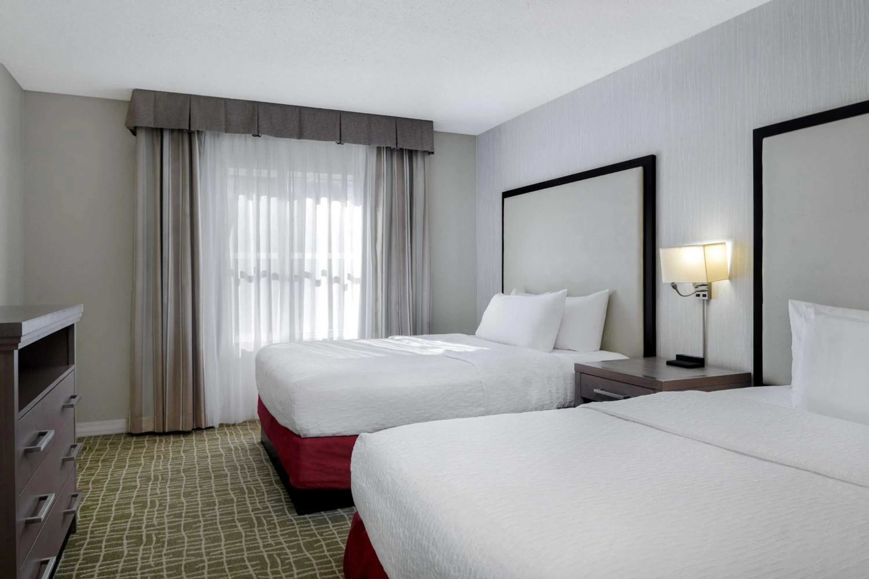 Bed in Homewood Suites by Hilton Tallahassee