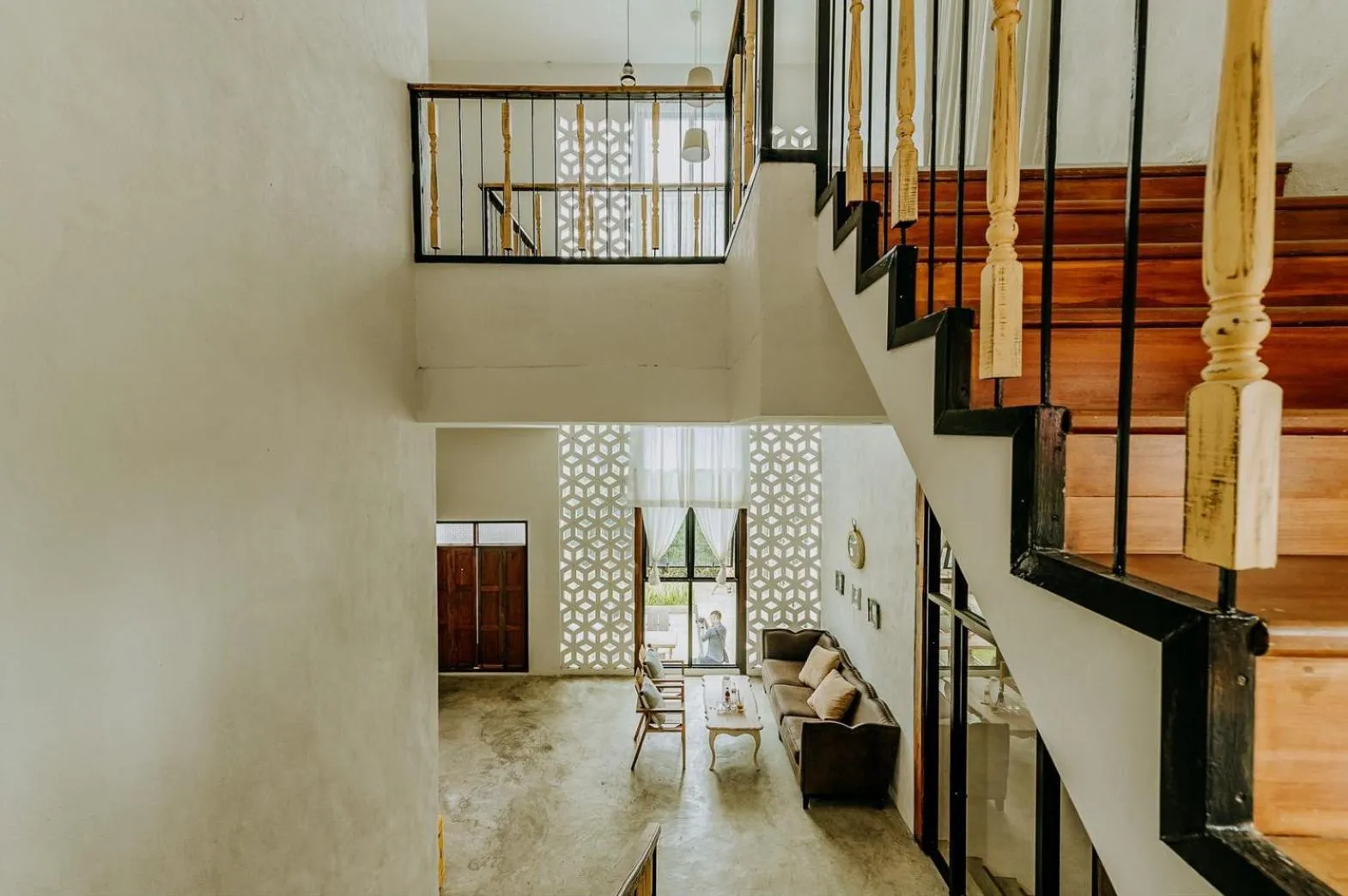 Seating area in White Wall Riverfront Hotel