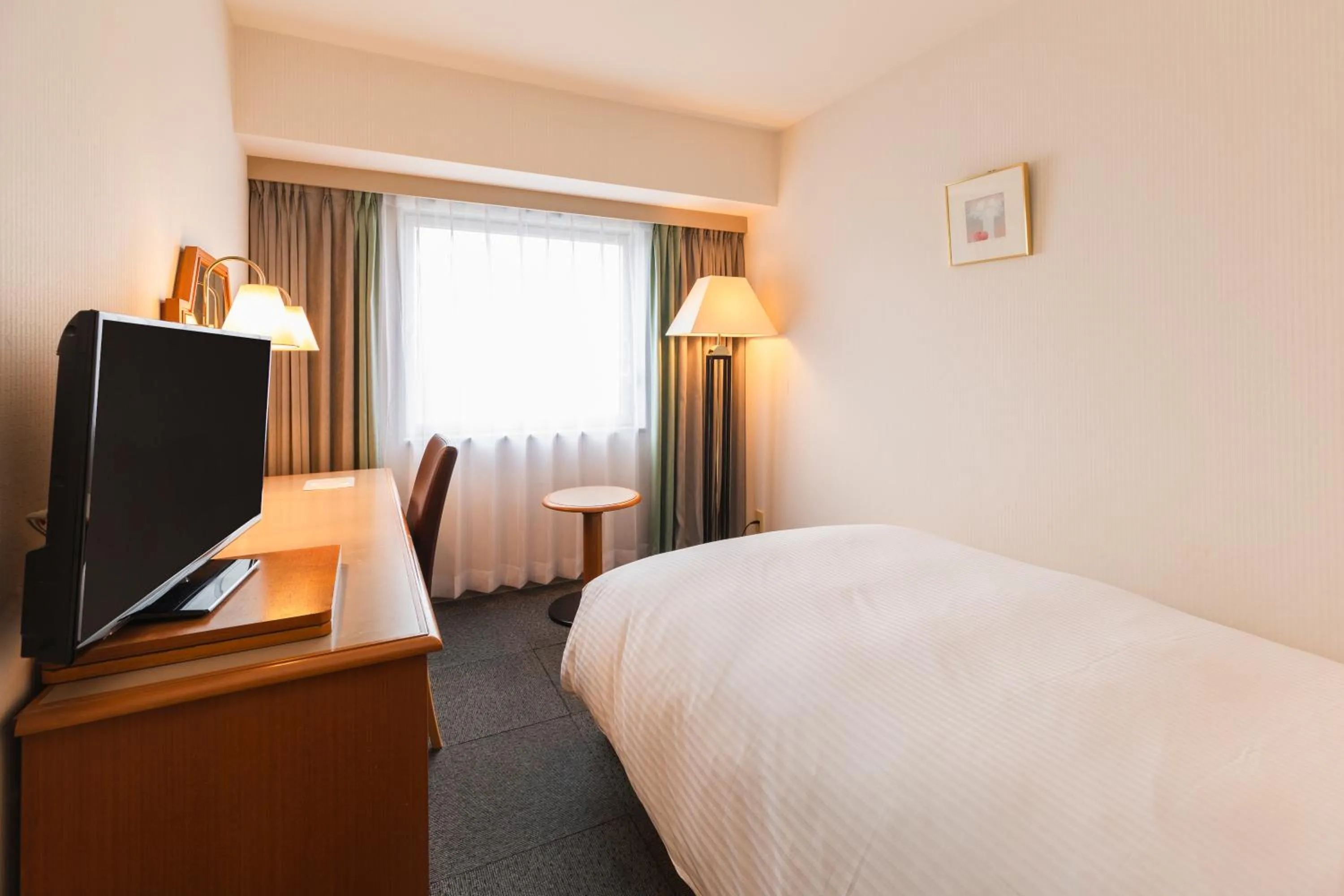 Photo of the whole room, Bed in Hotel Sunroute Niigata