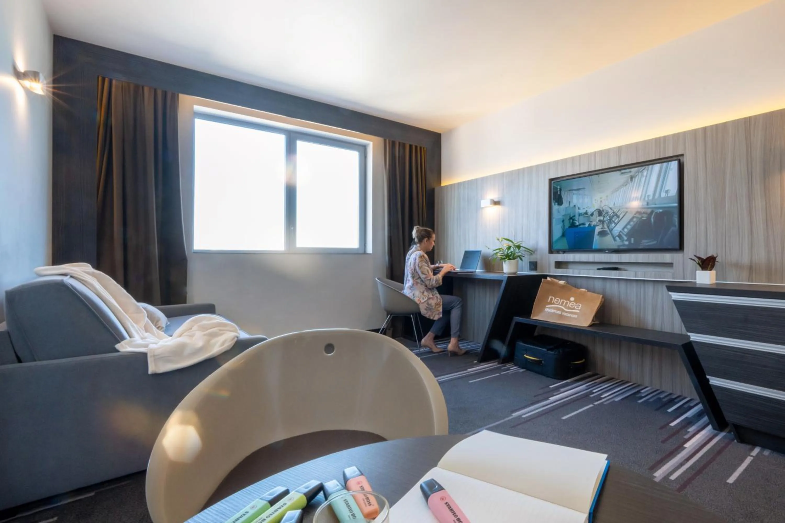 Seating area in Nemea Appart Hotel Concorde Toulouse Gare Matabiau