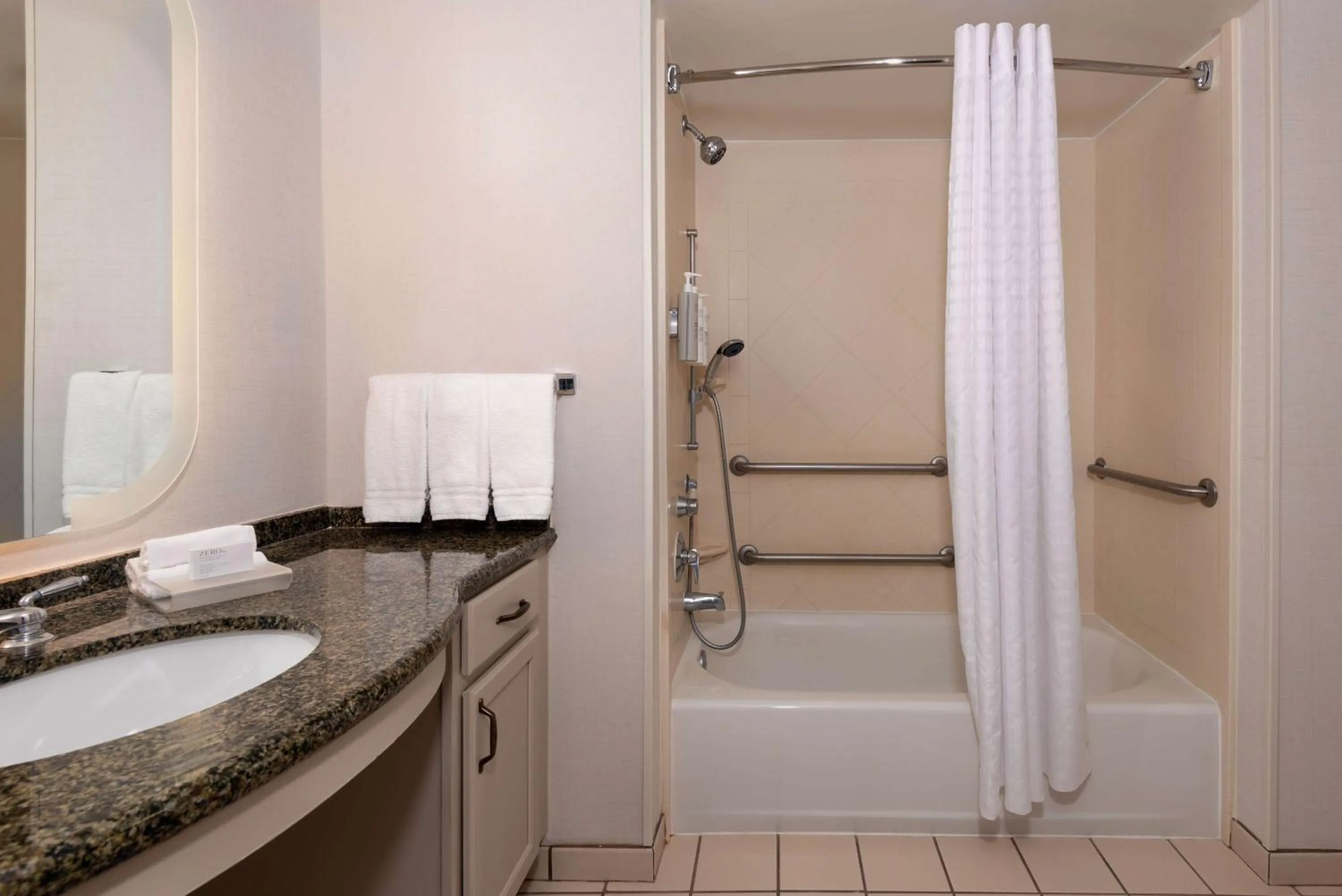 Bathroom in Homewood Suites by Hilton Tampa Airport - Westshore