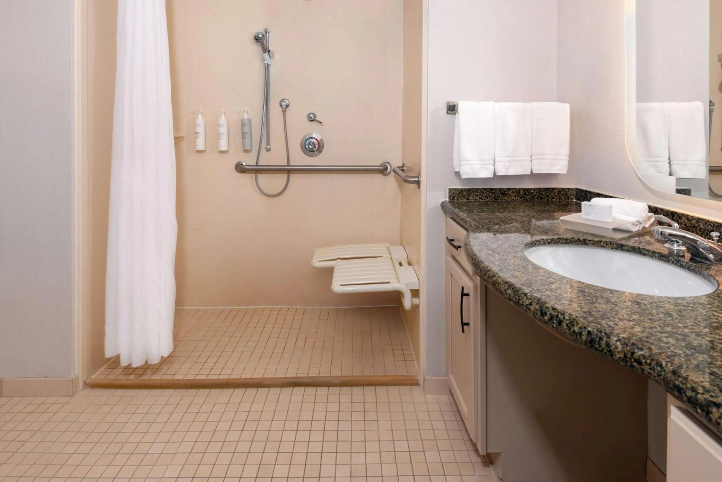 Bathroom in Homewood Suites by Hilton Tampa Airport - Westshore
