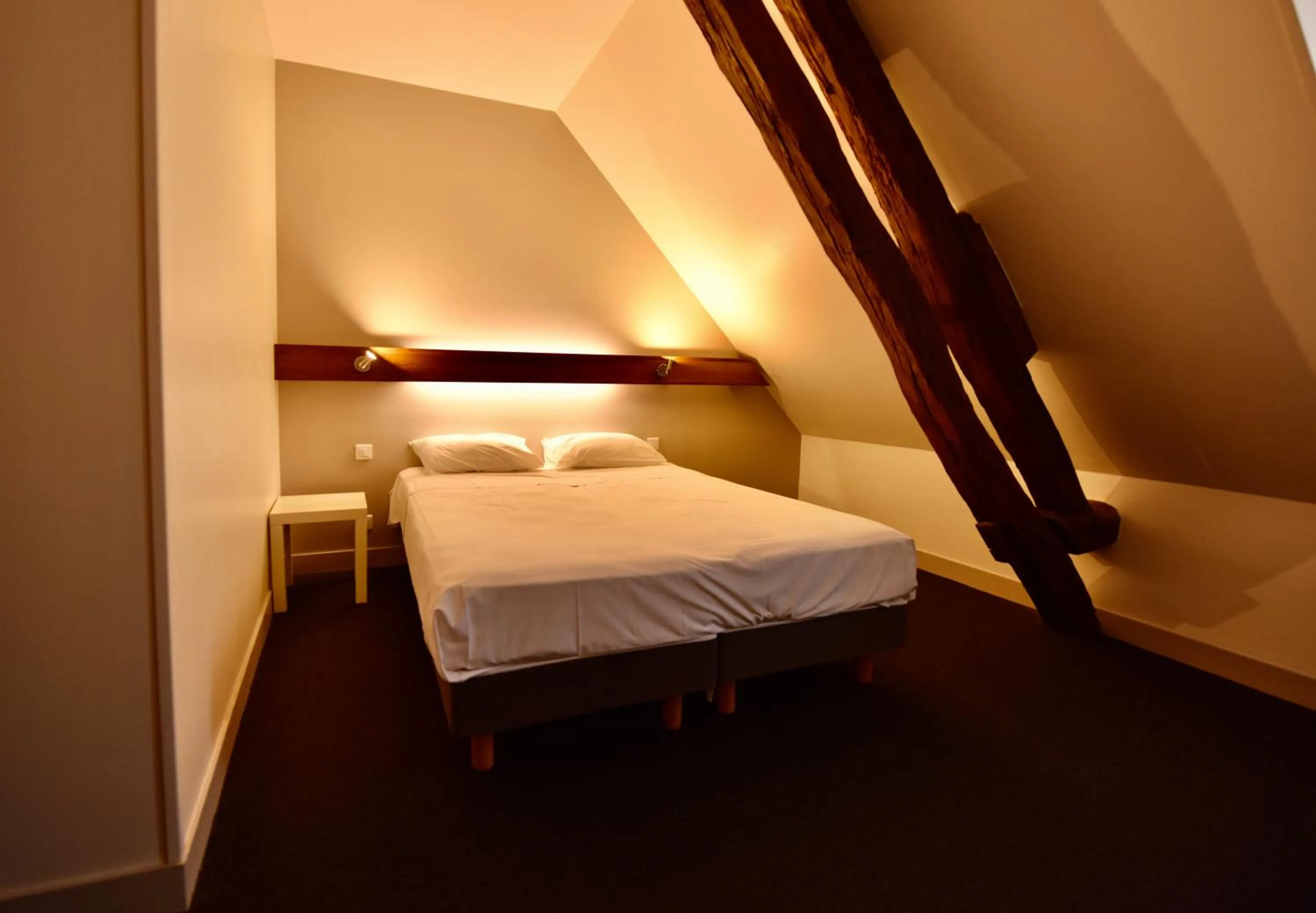 Bed in Le Relais du Château