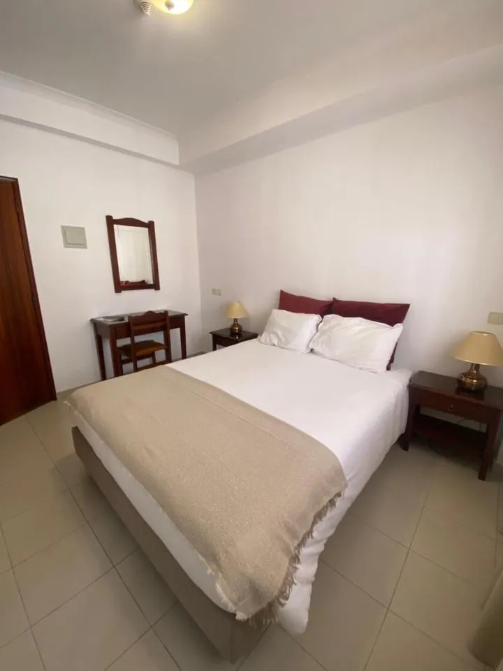 Bed in Fátima GuestHouse