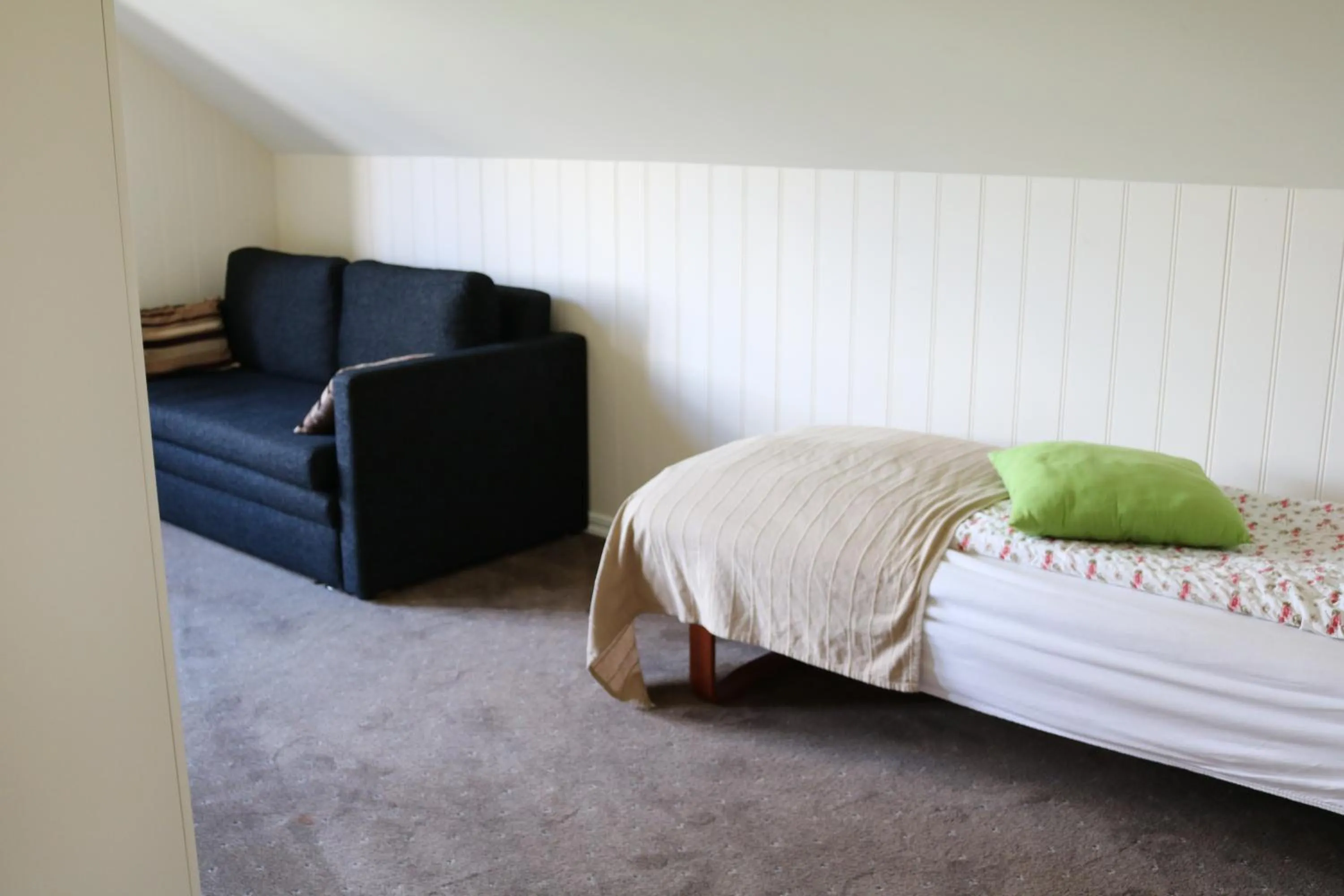 Bed in Sólheimahjáleiga Guesthouse