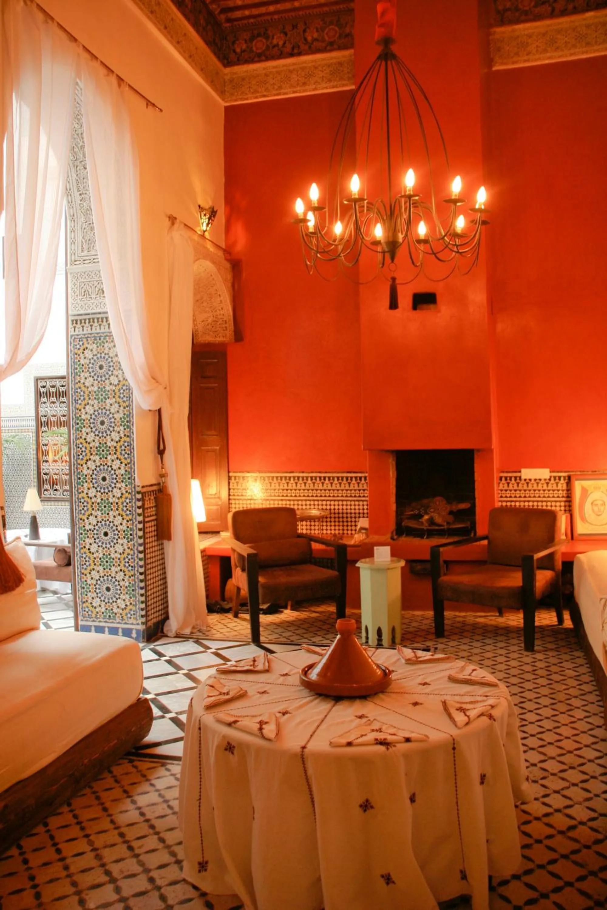 Communal lounge/ TV room, Bed in Riad Tizwa Fes