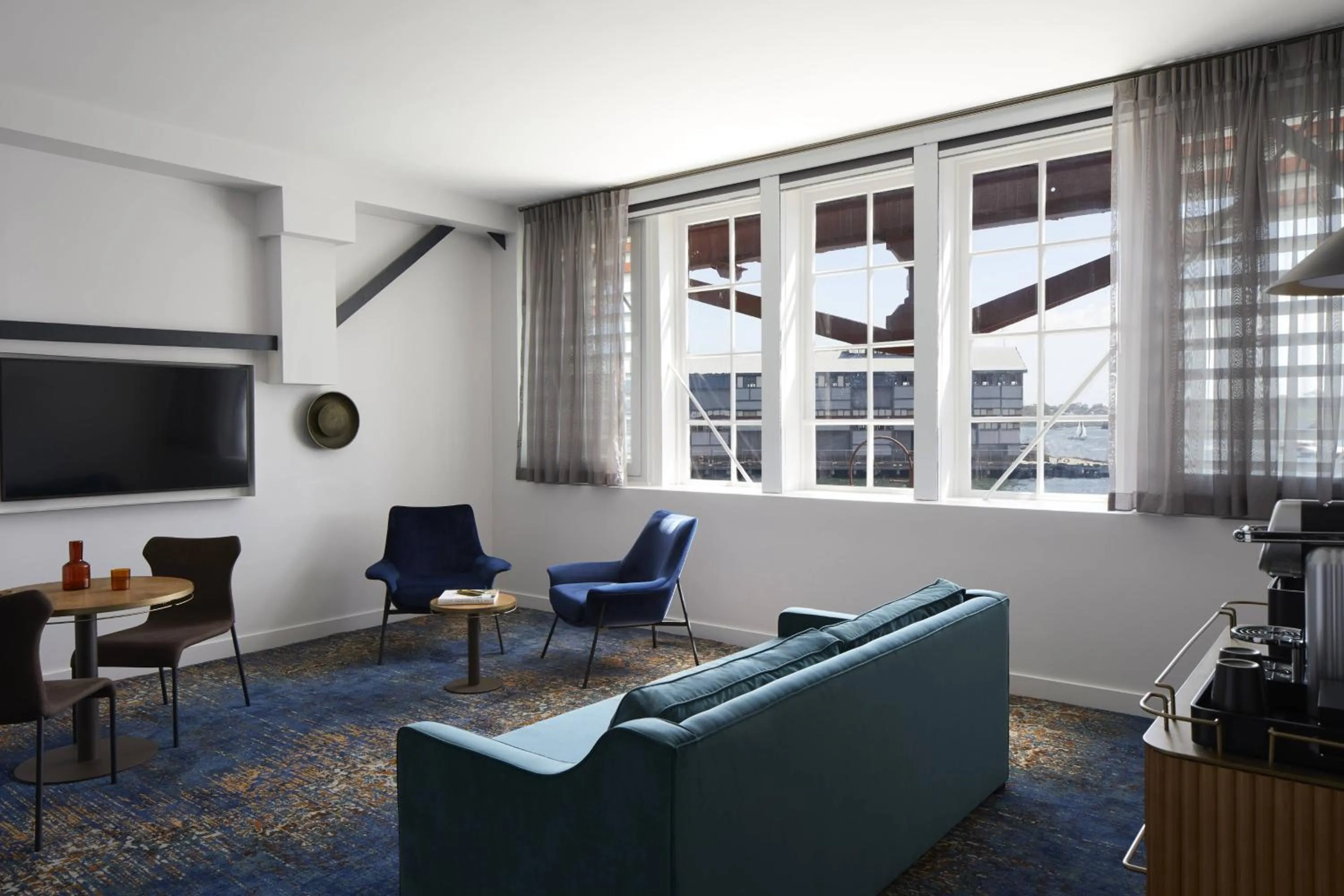 Living room in Pier One Sydney Harbour, Autograph Collection