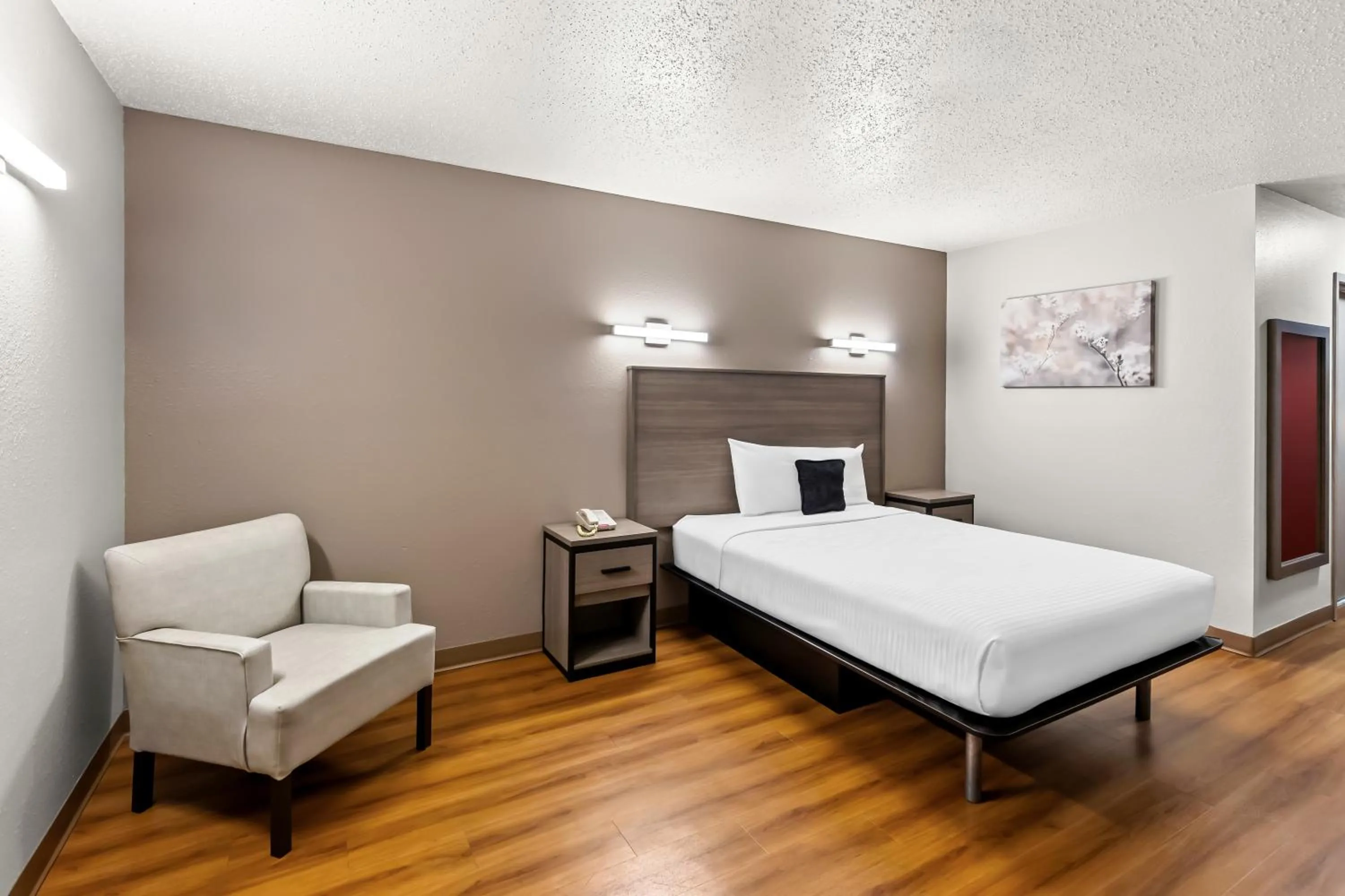 Bed in Red Lion Inn & Suites Saint Louis