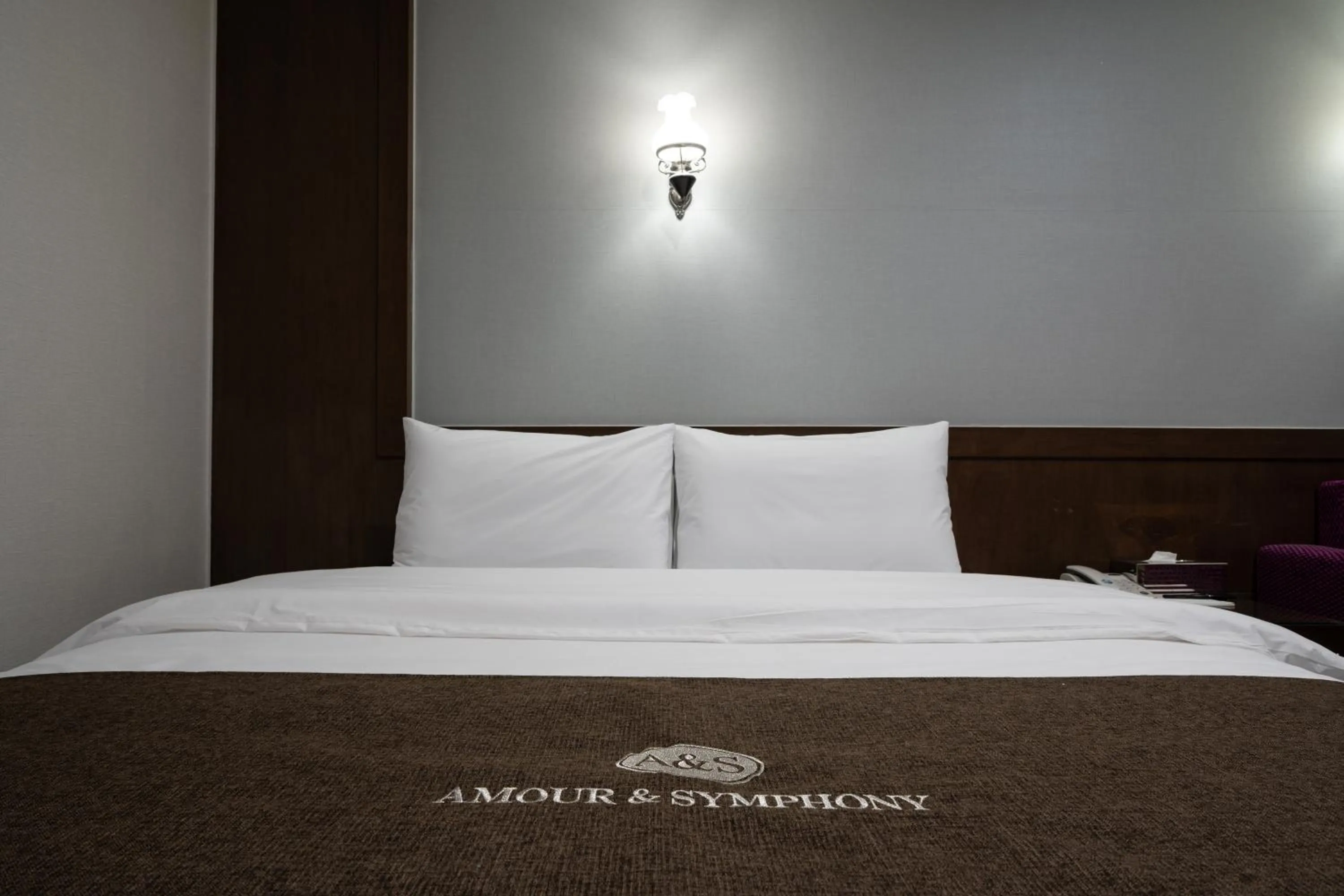 Bed in Symphony Hotel