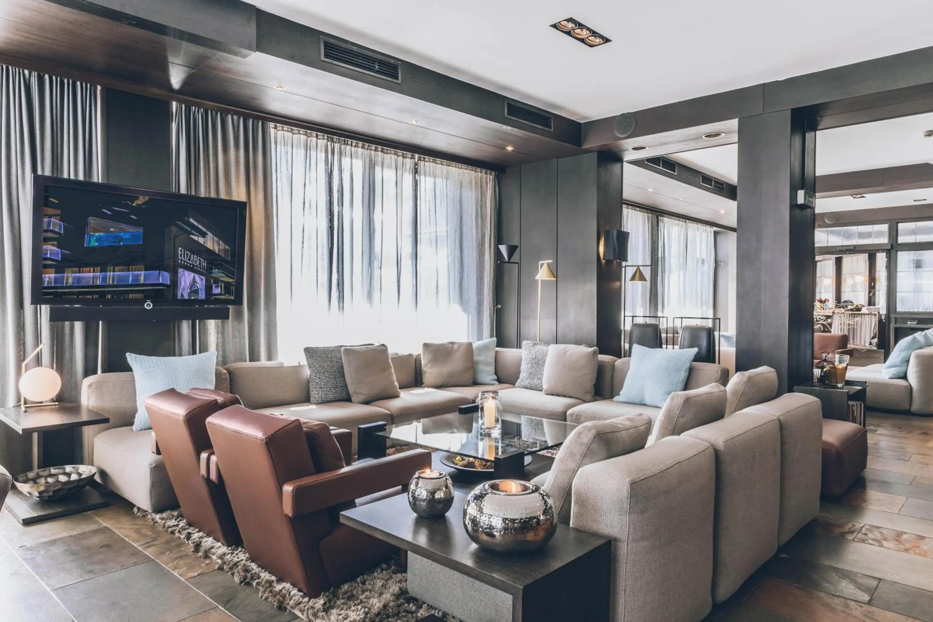 Communal lounge/ TV room in Elizabeth Arthotel Adults Only