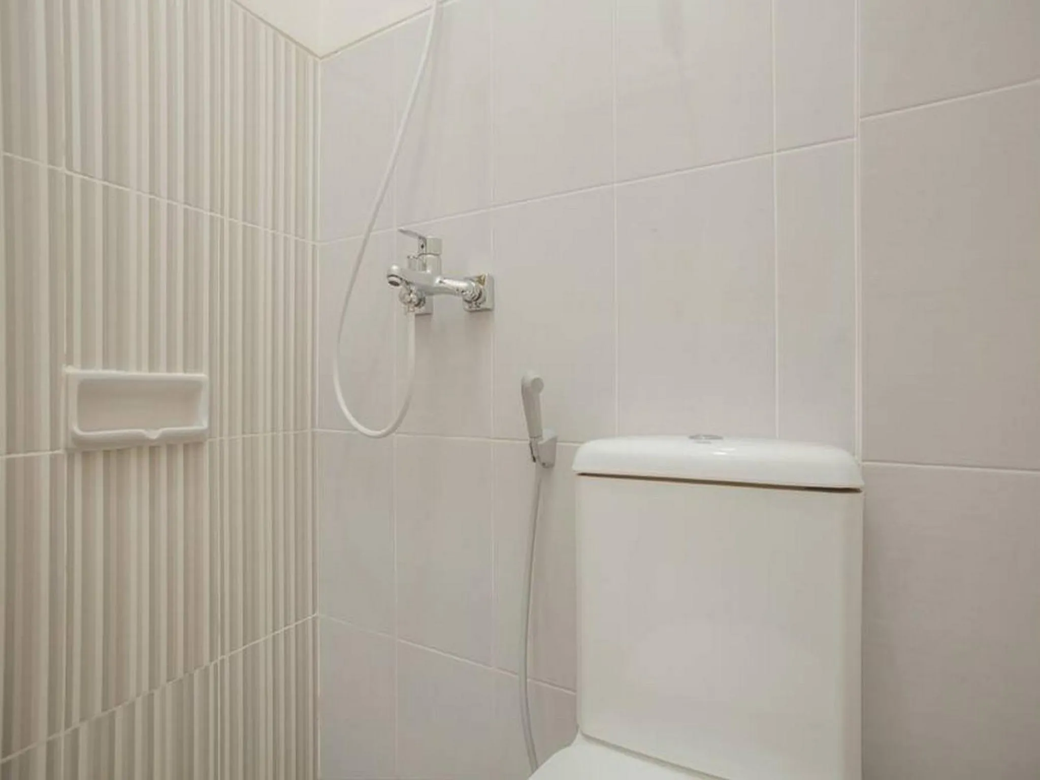 Bathroom in RedDoorz near Ciputra Golf Surabaya