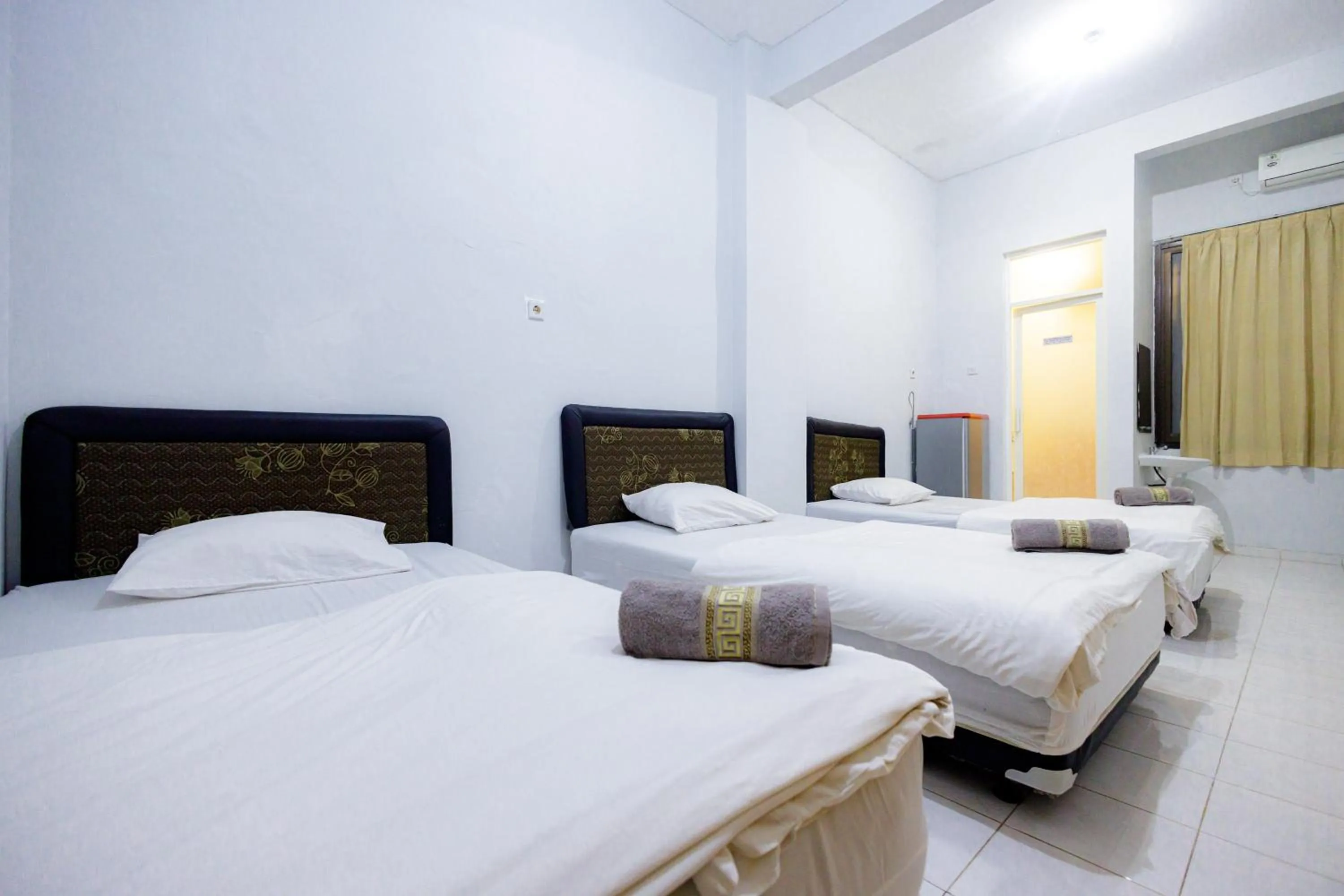 Bed in Marcello Residence Siwalankerto near Petra University Surabaya Mitra RedDoorz