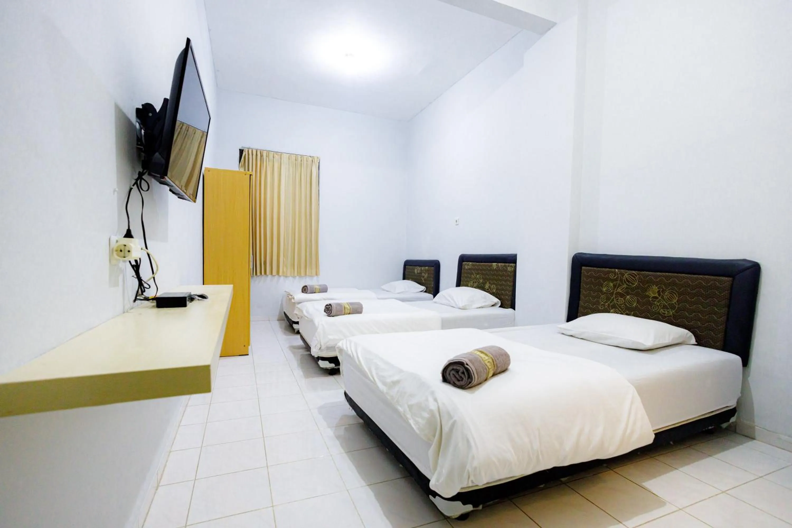 Bed in Marcello Residence Siwalankerto near Petra University Surabaya Mitra RedDoorz