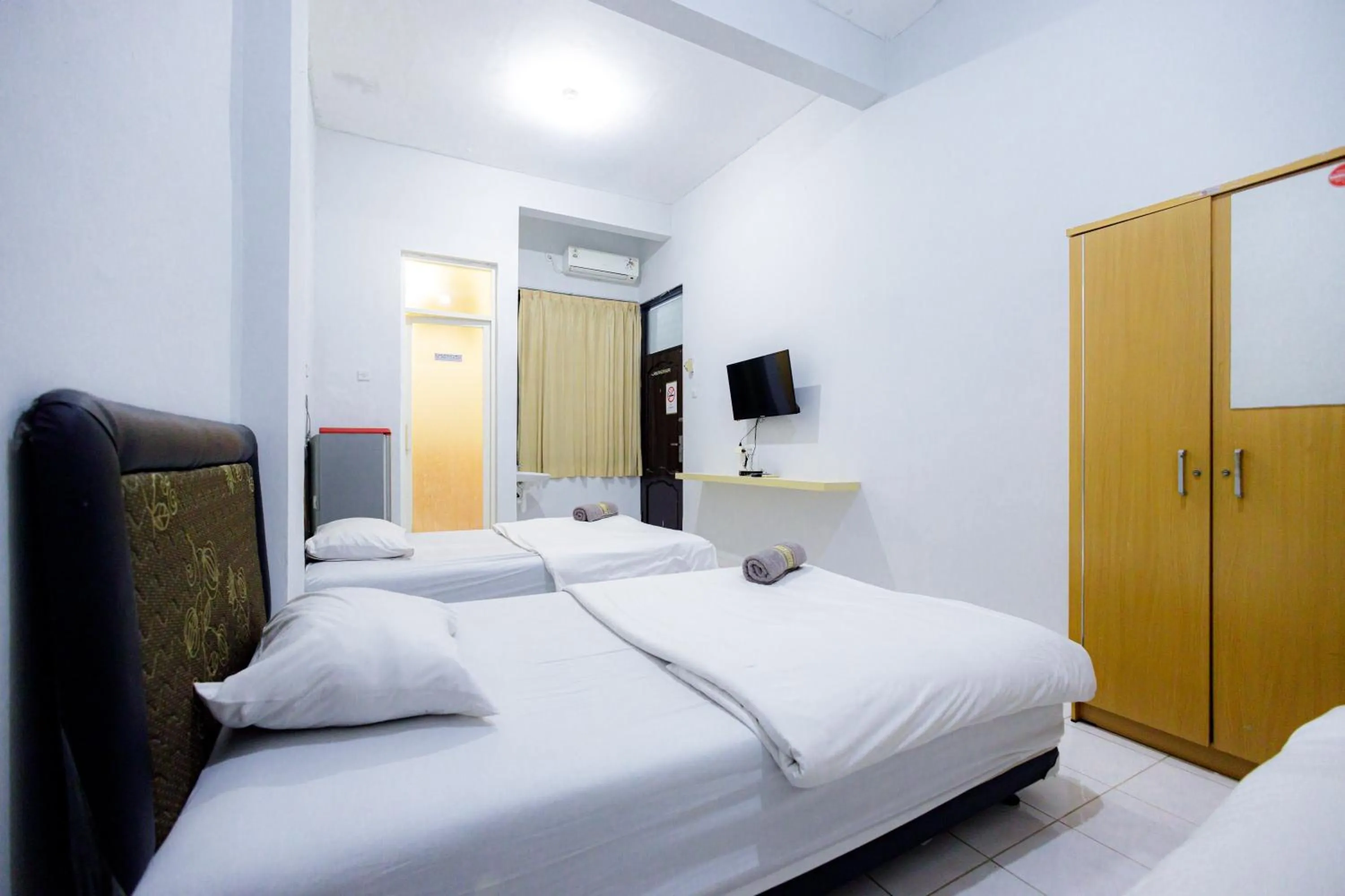 Bed in Marcello Residence Siwalankerto near Petra University Surabaya Mitra RedDoorz