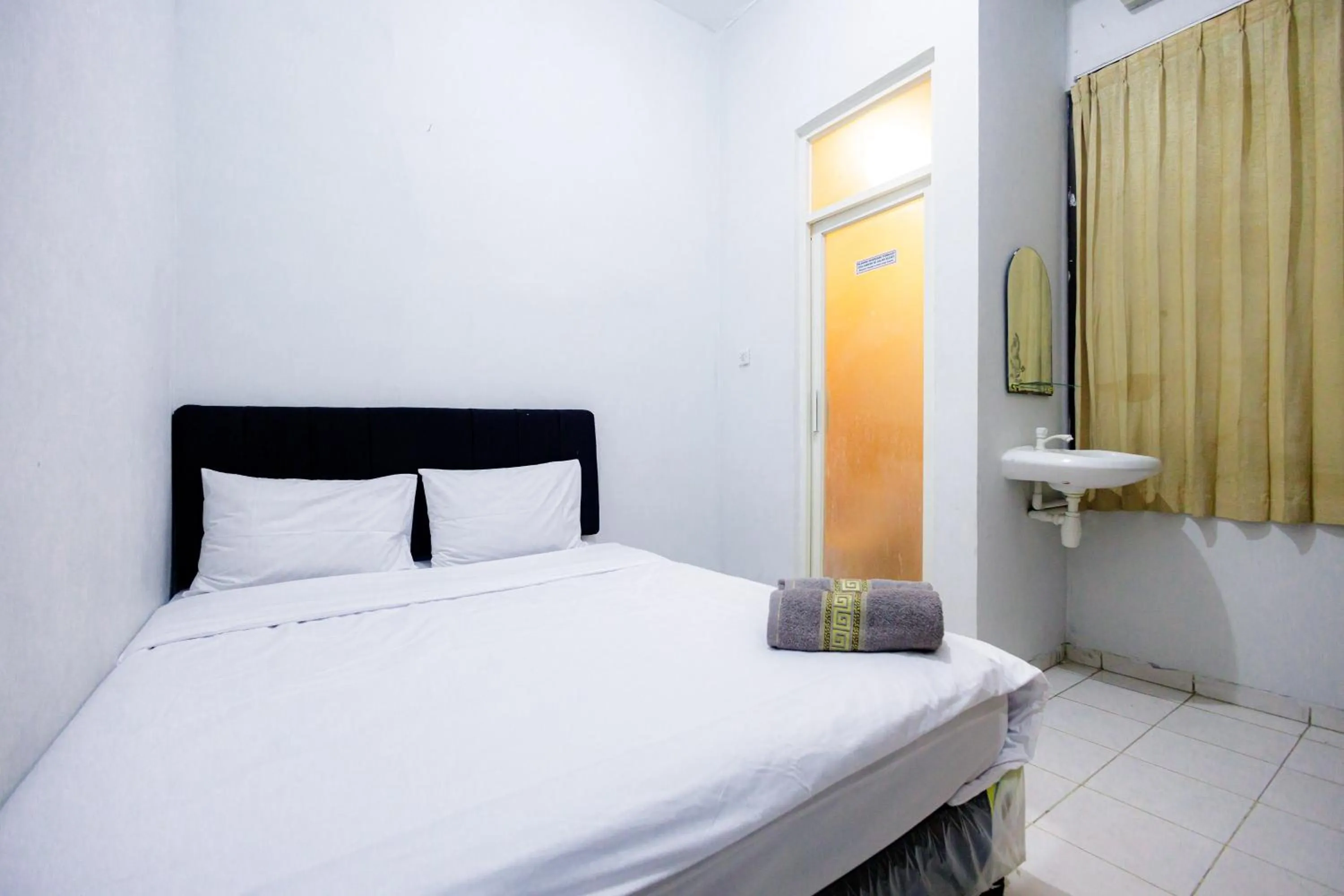 Bed in Marcello Residence Siwalankerto near Petra University Surabaya Mitra RedDoorz