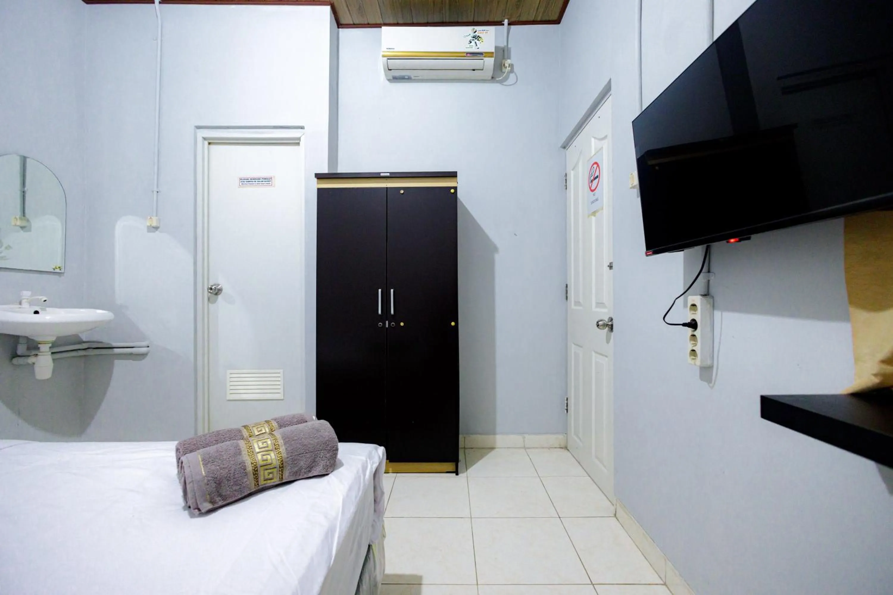 Bed in Marcello Residence Siwalankerto near Petra University Surabaya Mitra RedDoorz
