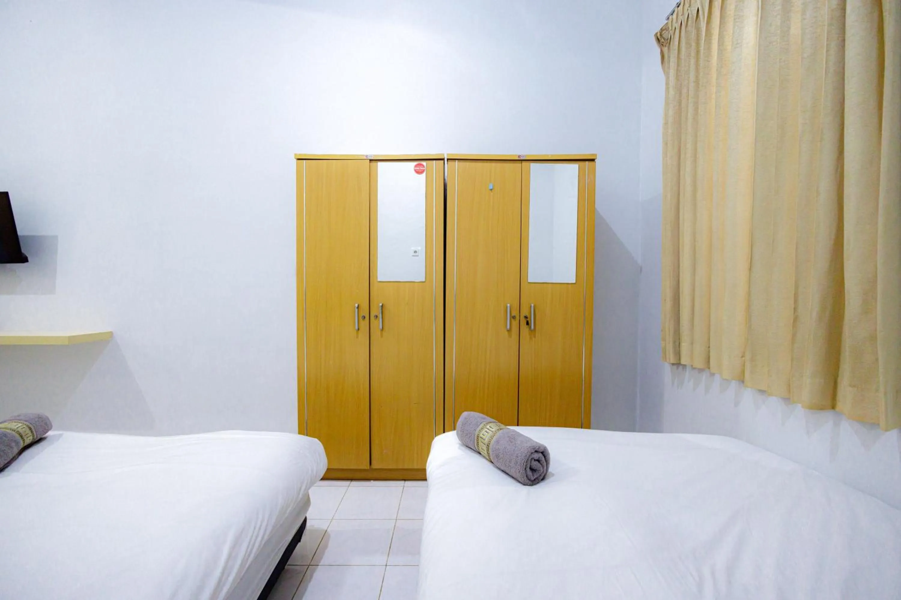 Bed in Marcello Residence Siwalankerto near Petra University Surabaya Mitra RedDoorz