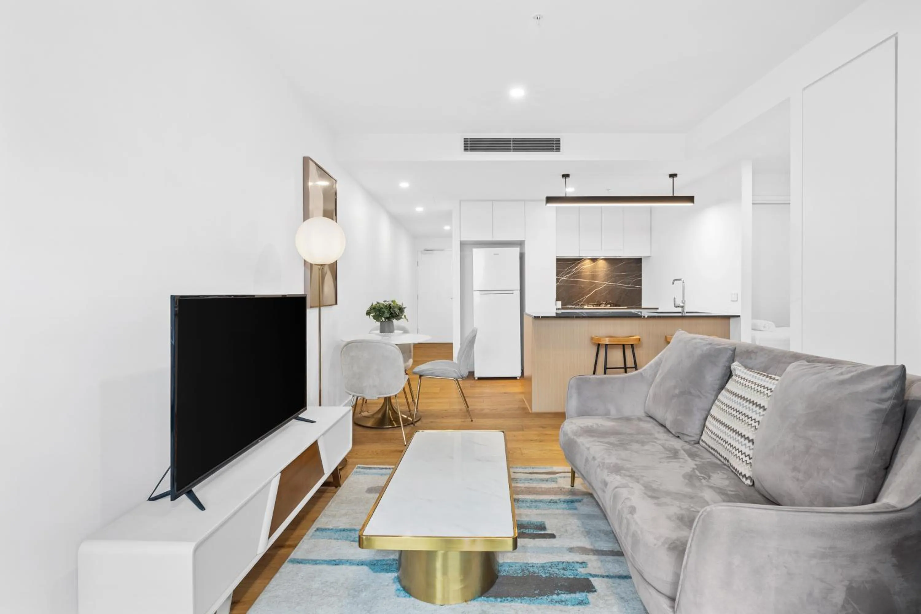 TV and multimedia in Brisbane One Apartments by CLLIX