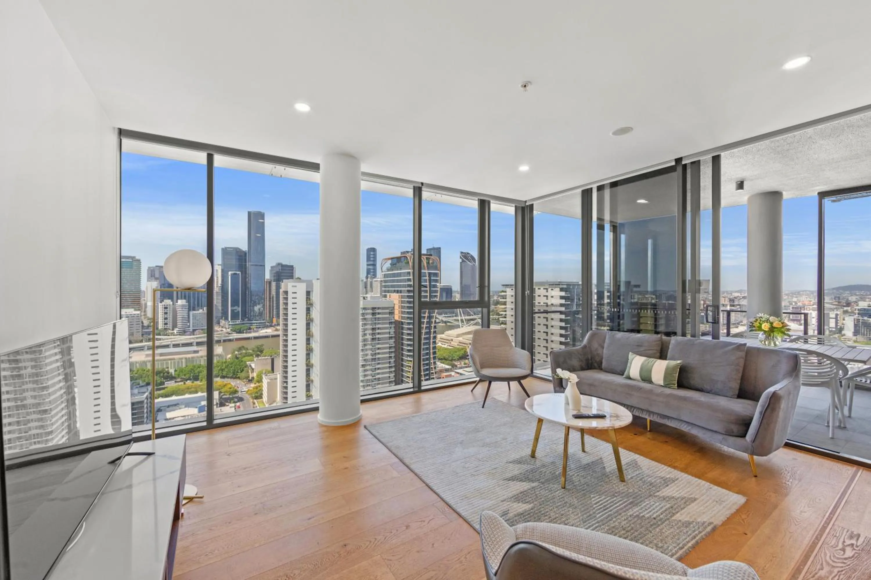 Living room in Brisbane One Apartments by CLLIX