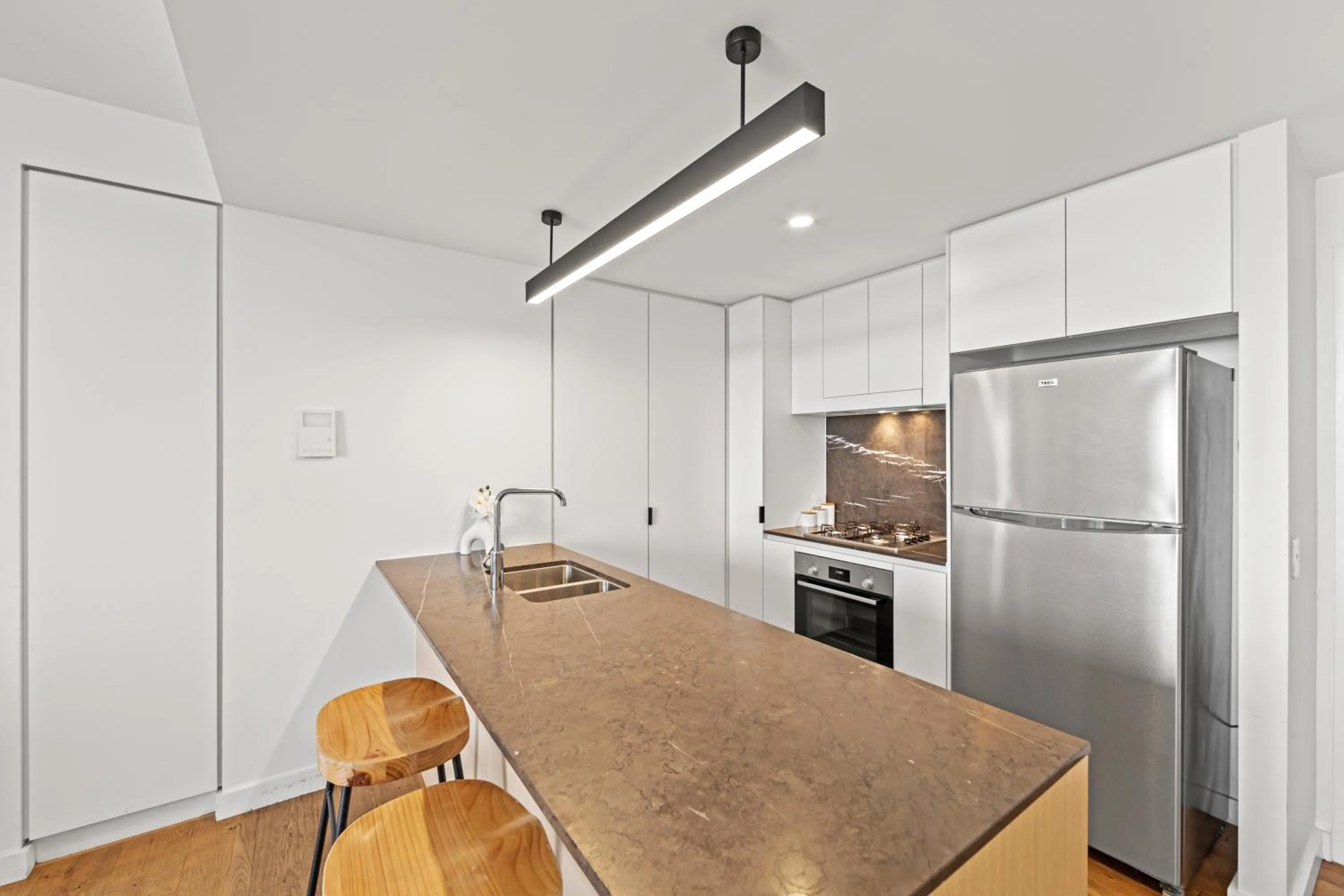 Kitchen or kitchenette in Brisbane One Apartments by CLLIX