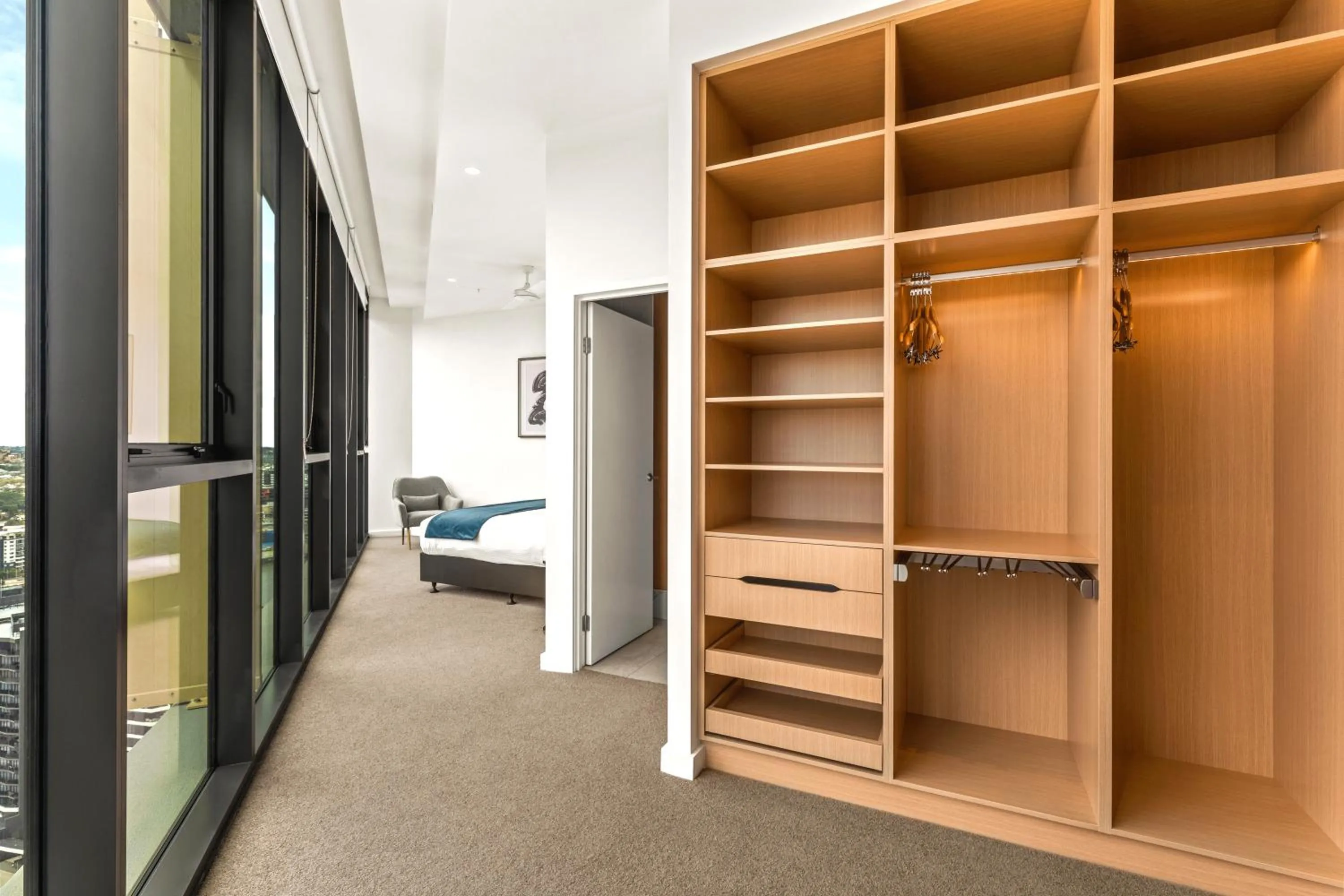 wardrobe in Brisbane One Apartments by CLLIX