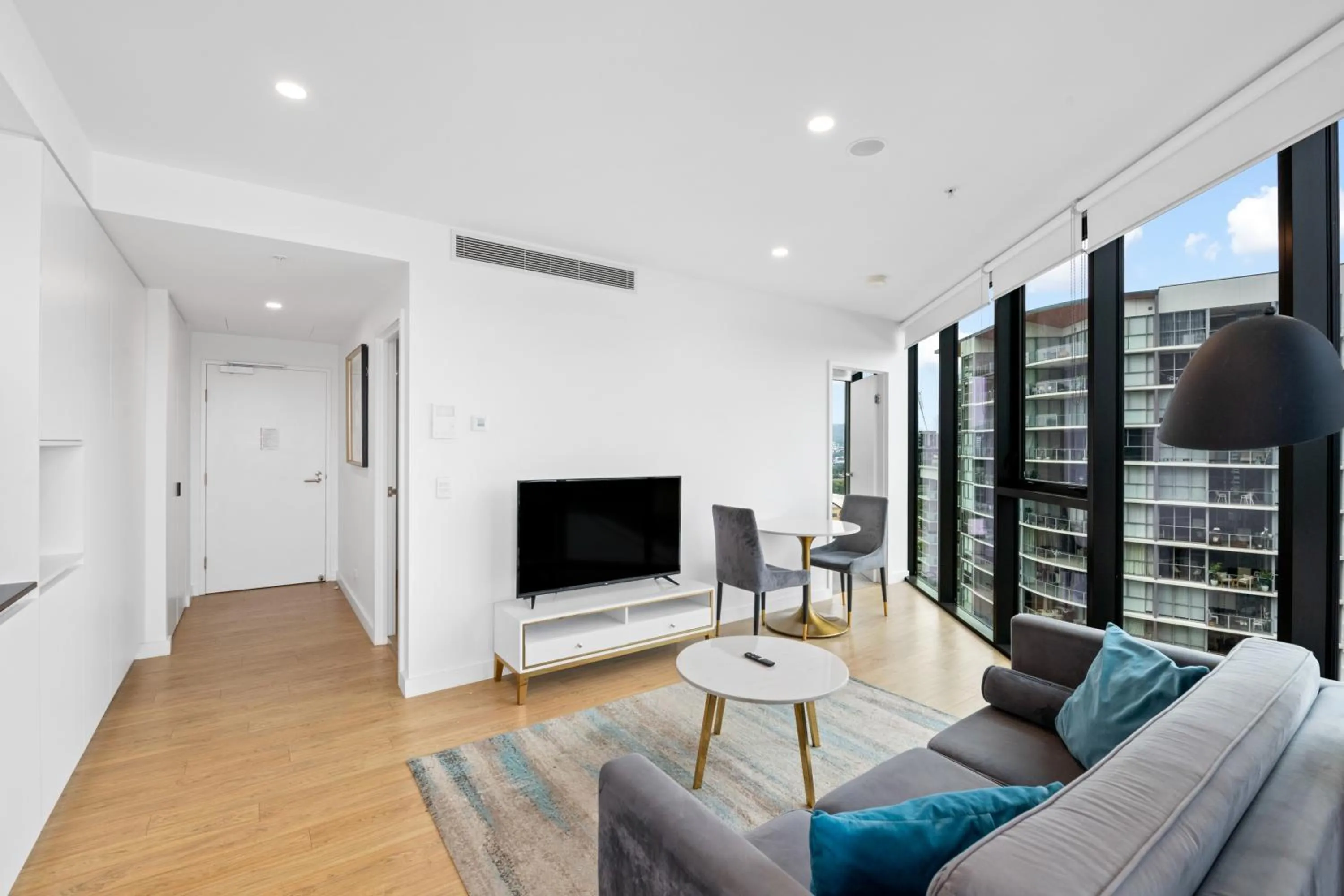 TV and multimedia in Brisbane One Apartments by CLLIX