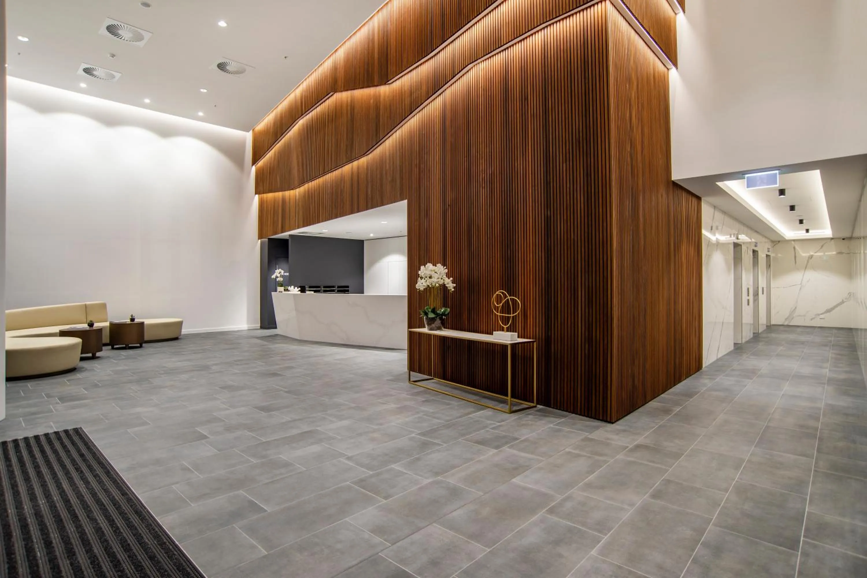 Lobby or reception in Brisbane One Apartments by CLLIX