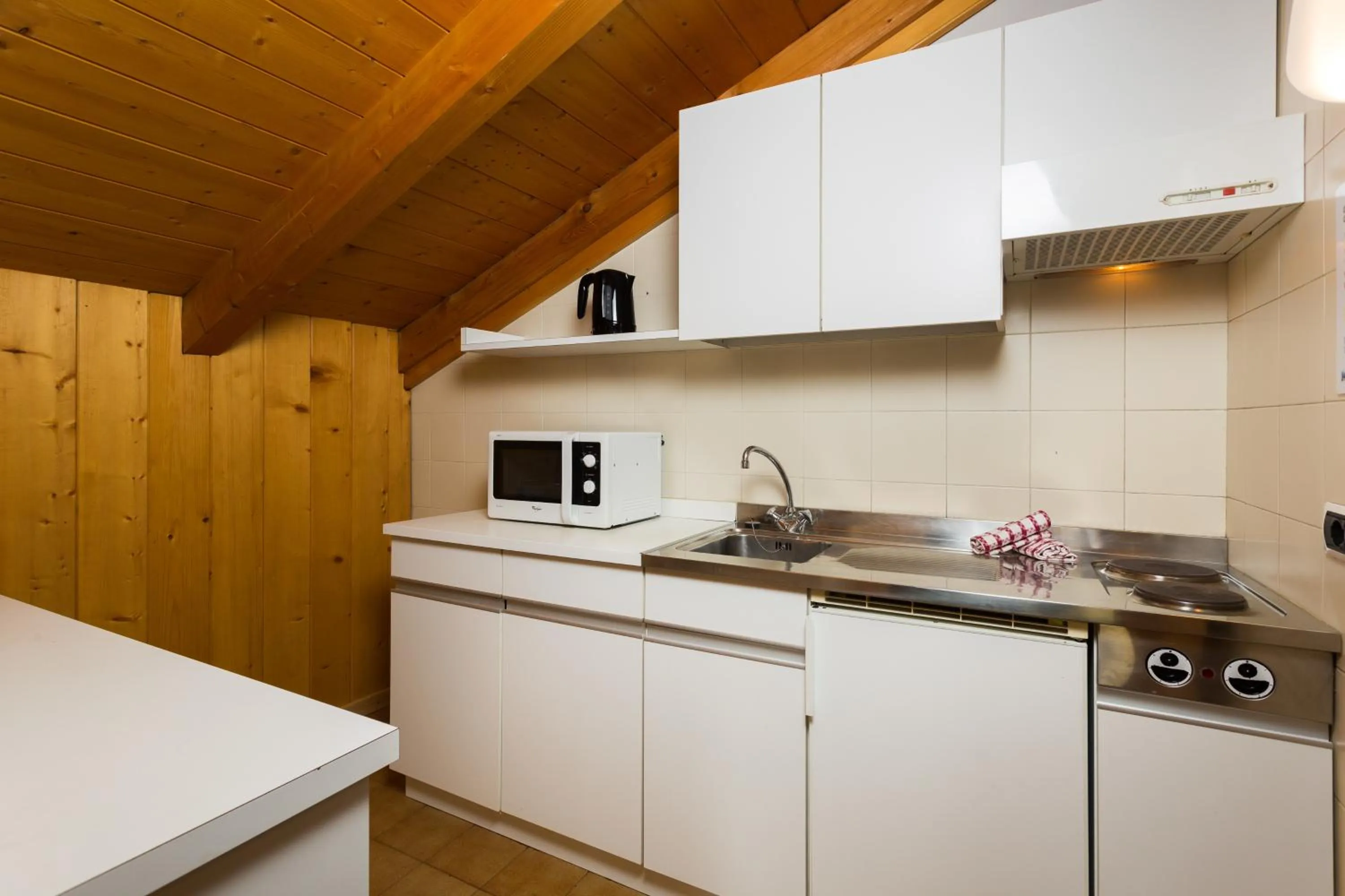 Kitchen or kitchenette in Ambiez Residencehotel