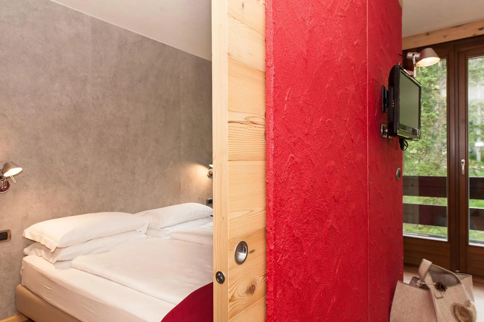 Bed in Ambiez Residencehotel