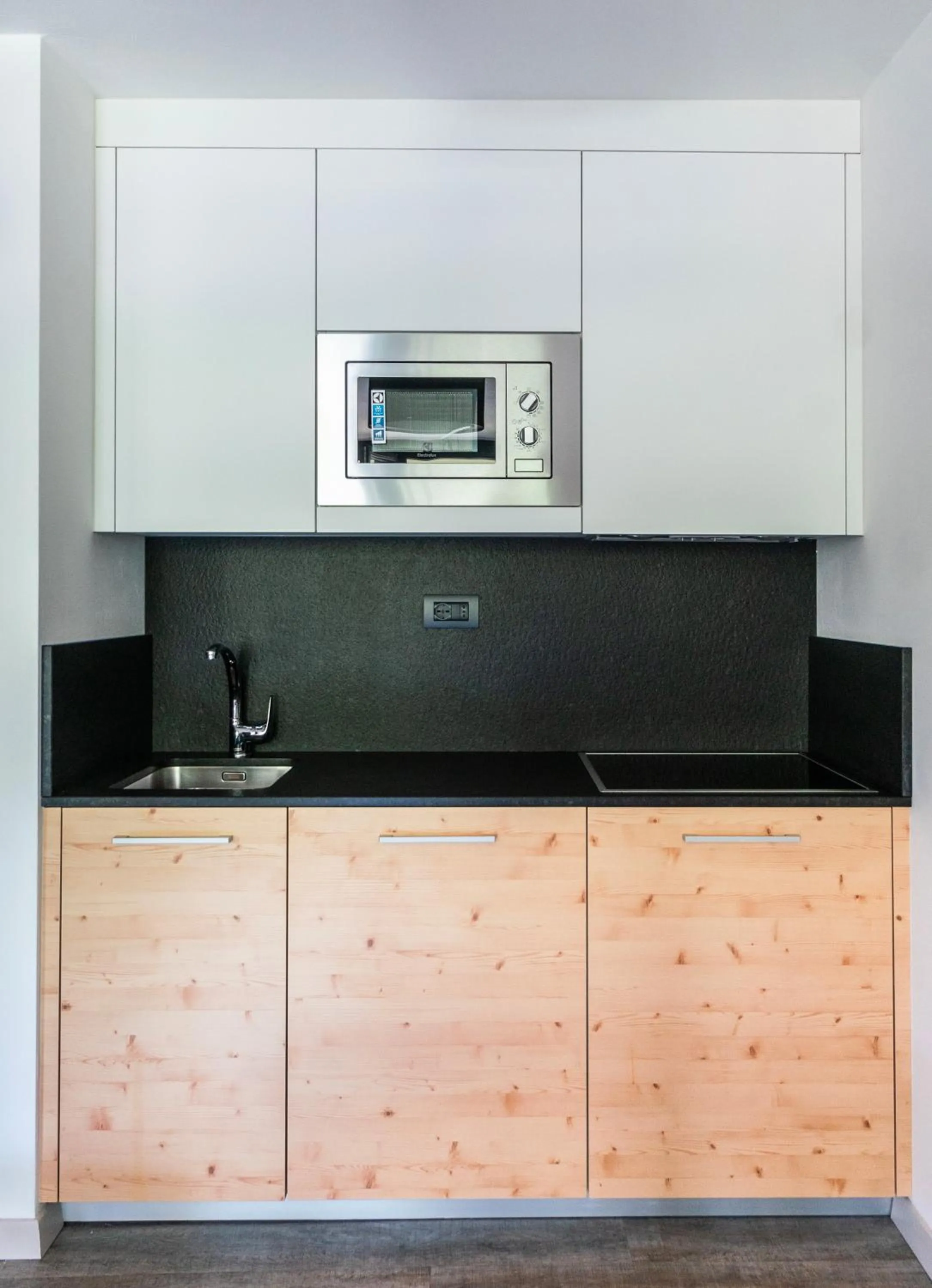 Kitchen or kitchenette in Ambiez Residencehotel