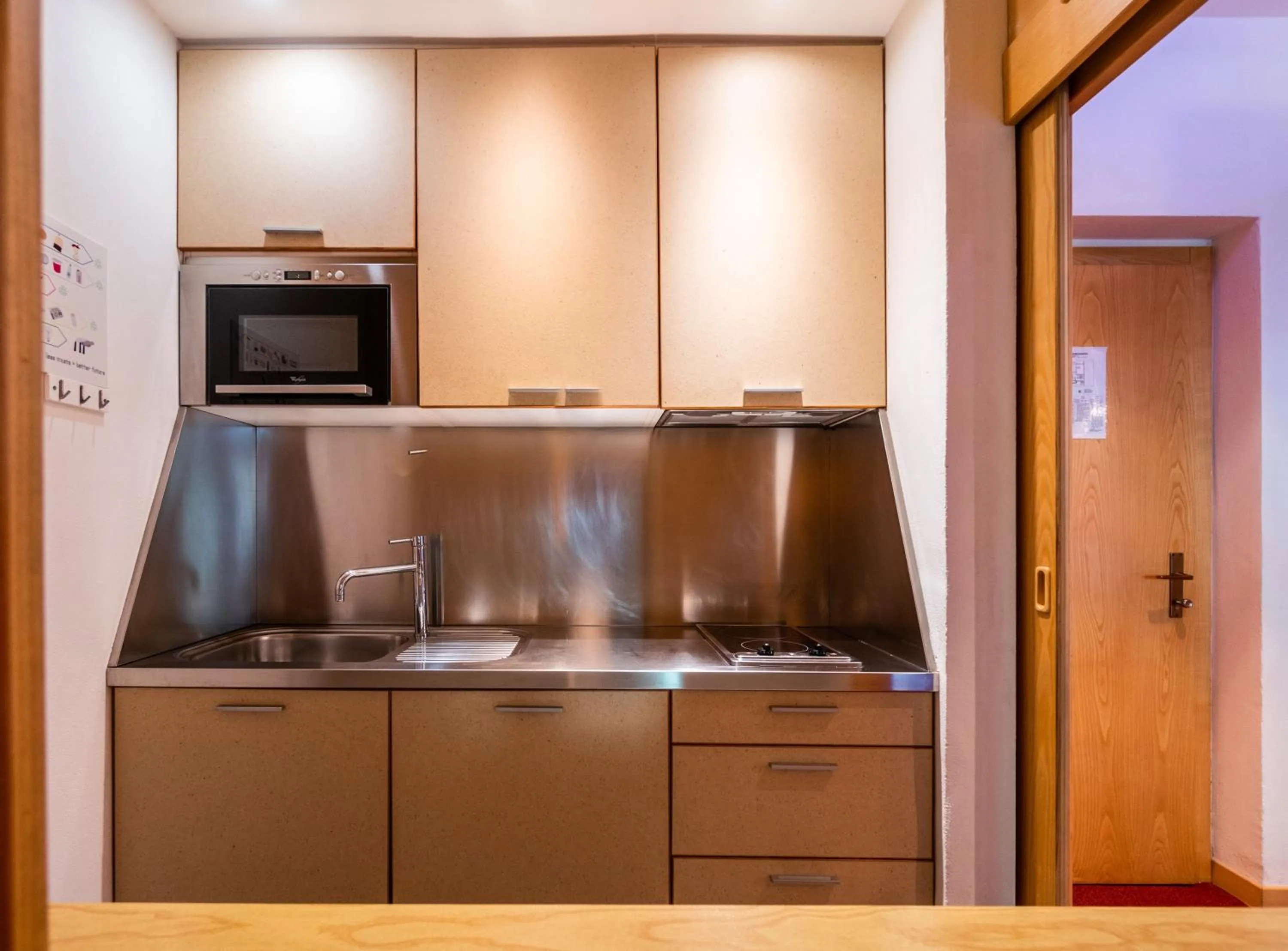 Kitchen or kitchenette in Ambiez Residencehotel