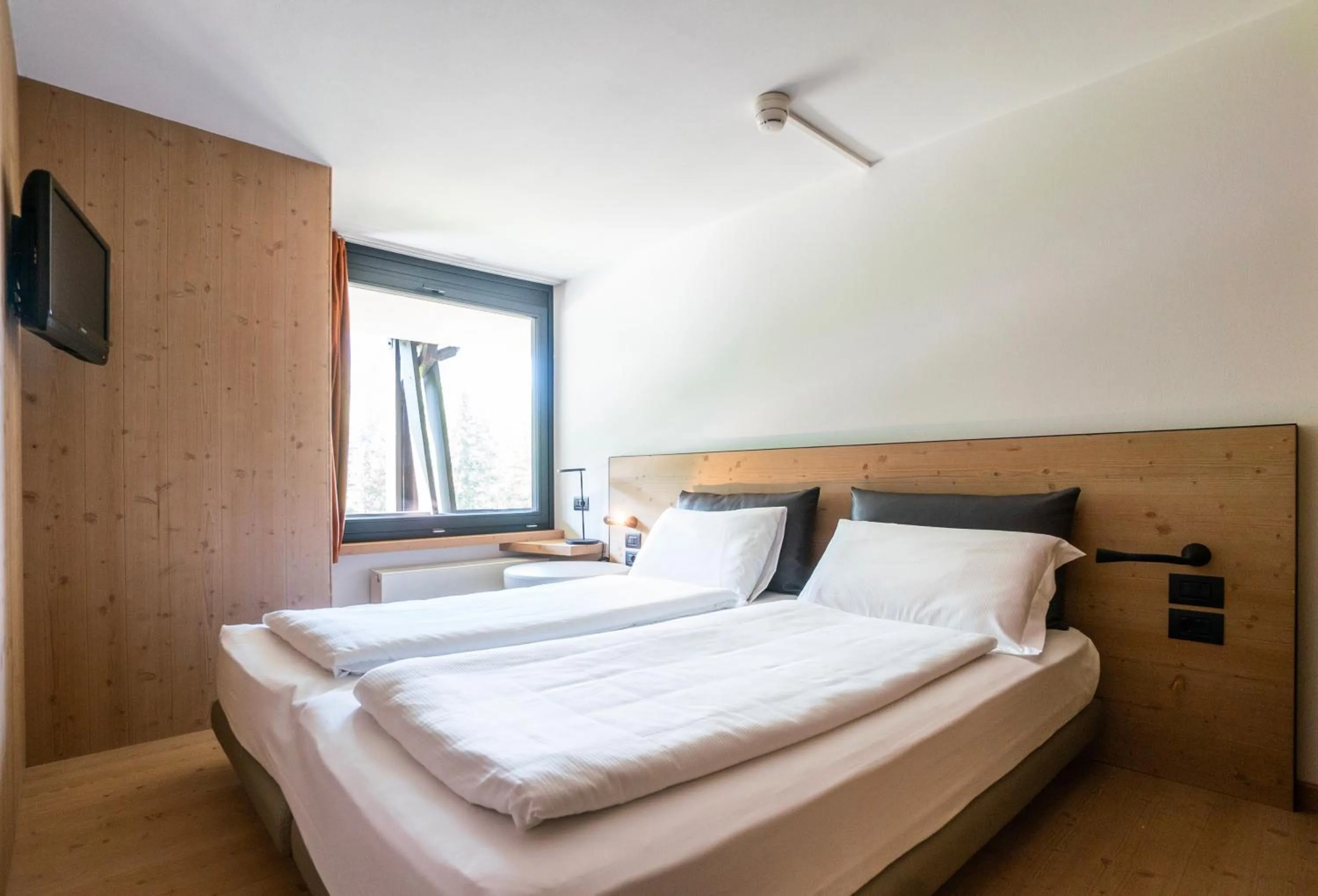 Bed in Ambiez Residencehotel